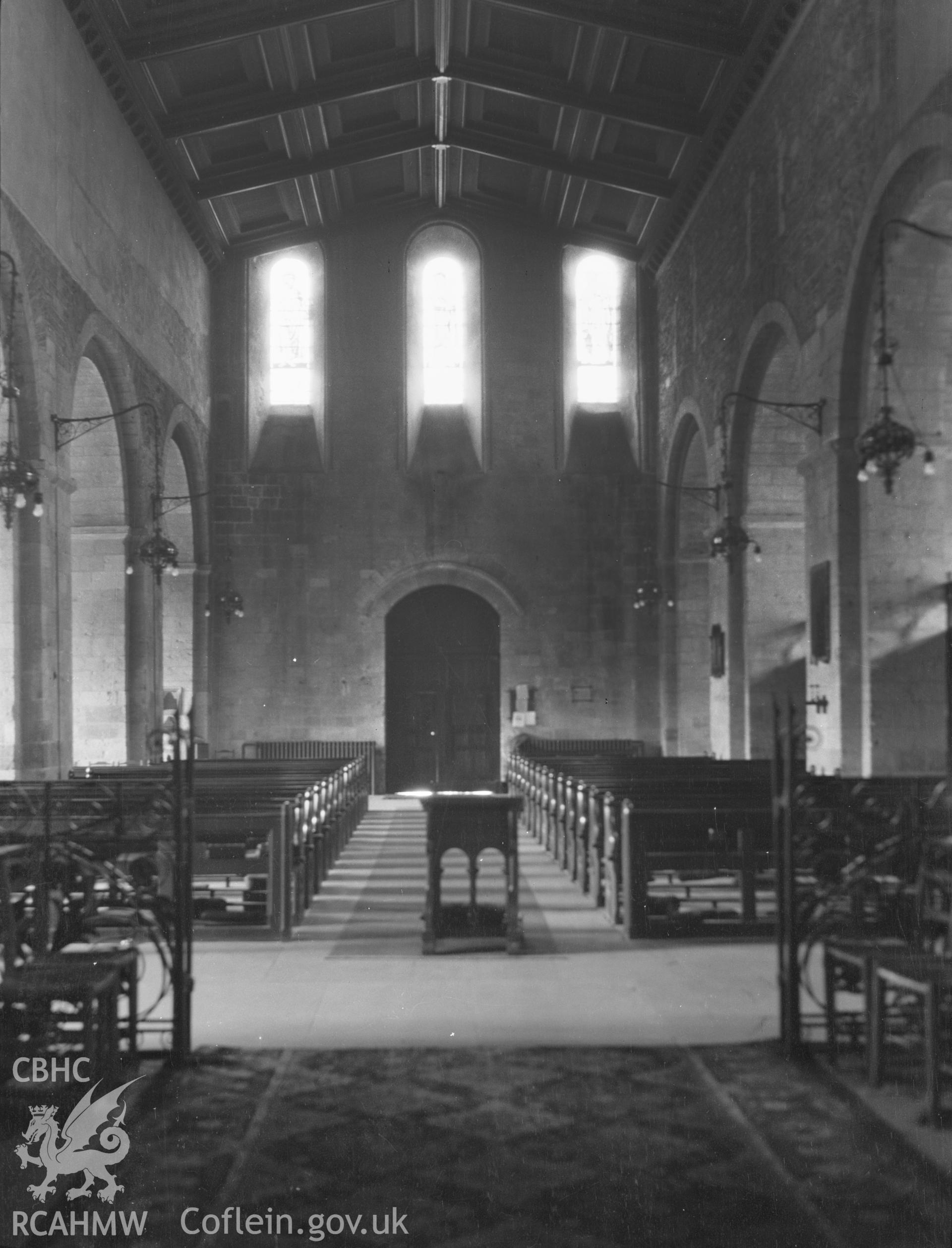 Digital copy of a nitrate negative showing interior of St Mary's Church, Margam - looking towards the church door. From the National Building Record Postcard Collection.