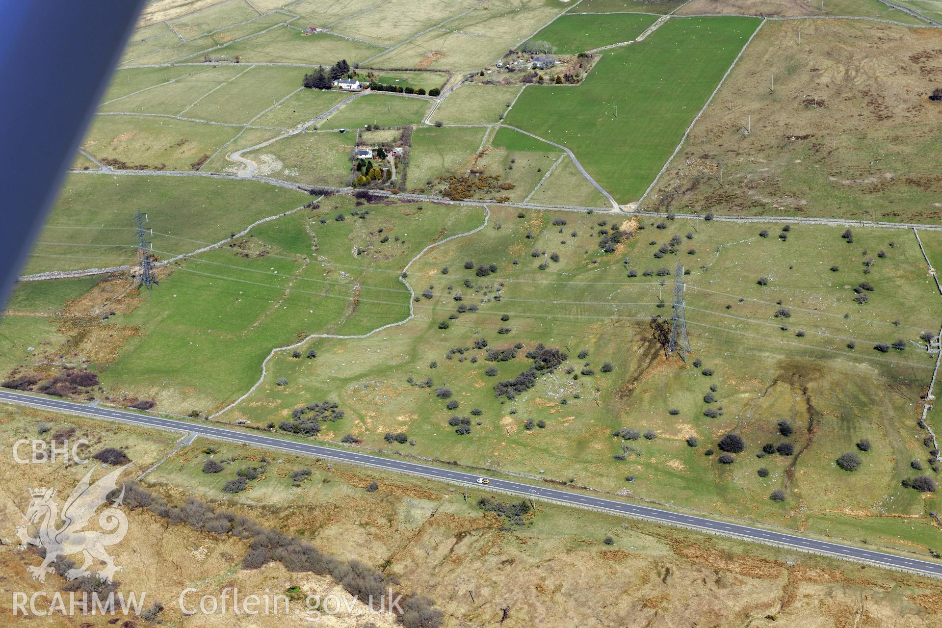 North field system, Caerau; east settlement, Caerau; west settlement, Caerau; settlement II, Caerau. Oblique aerial photograph taken during the Royal Commission?s programme of archaeological aerial reconnaissance by Toby Driver on 1st May 2013.