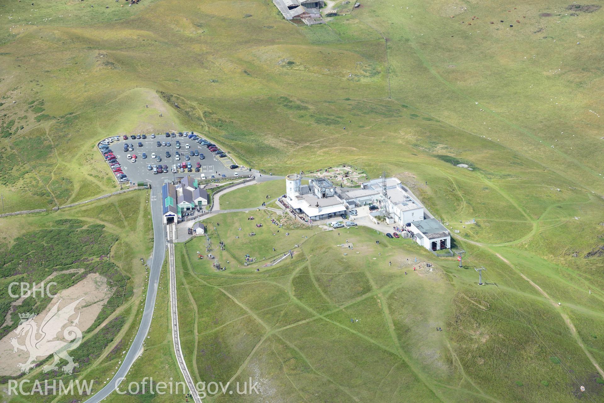 Great Orme, including views of a deserted rural settlement; ridge and furrow field system; visitor centre; telegraph station; telegraph hotel and White Farm. Oblique aerial photograph taken during the Royal Commission's programme of archaeological aerial reconnaissance by Toby Driver on 30th July 2015.