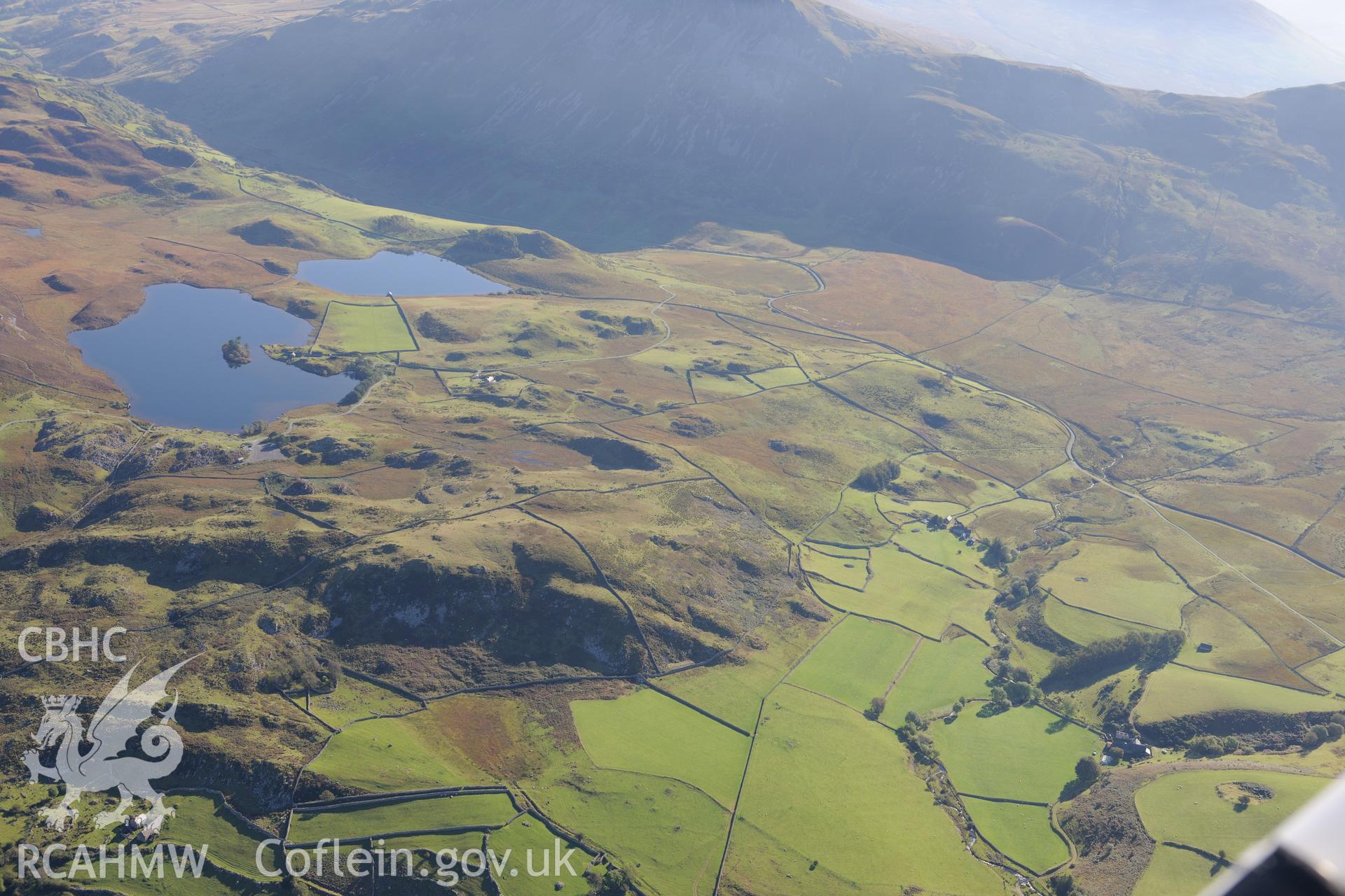 Cadair Idris and Llynnau Cregennen. Oblique aerial photograph taken during the Royal Commission's programme of archaeological aerial reconnaissance by Toby Driver on 2nd October 2015.