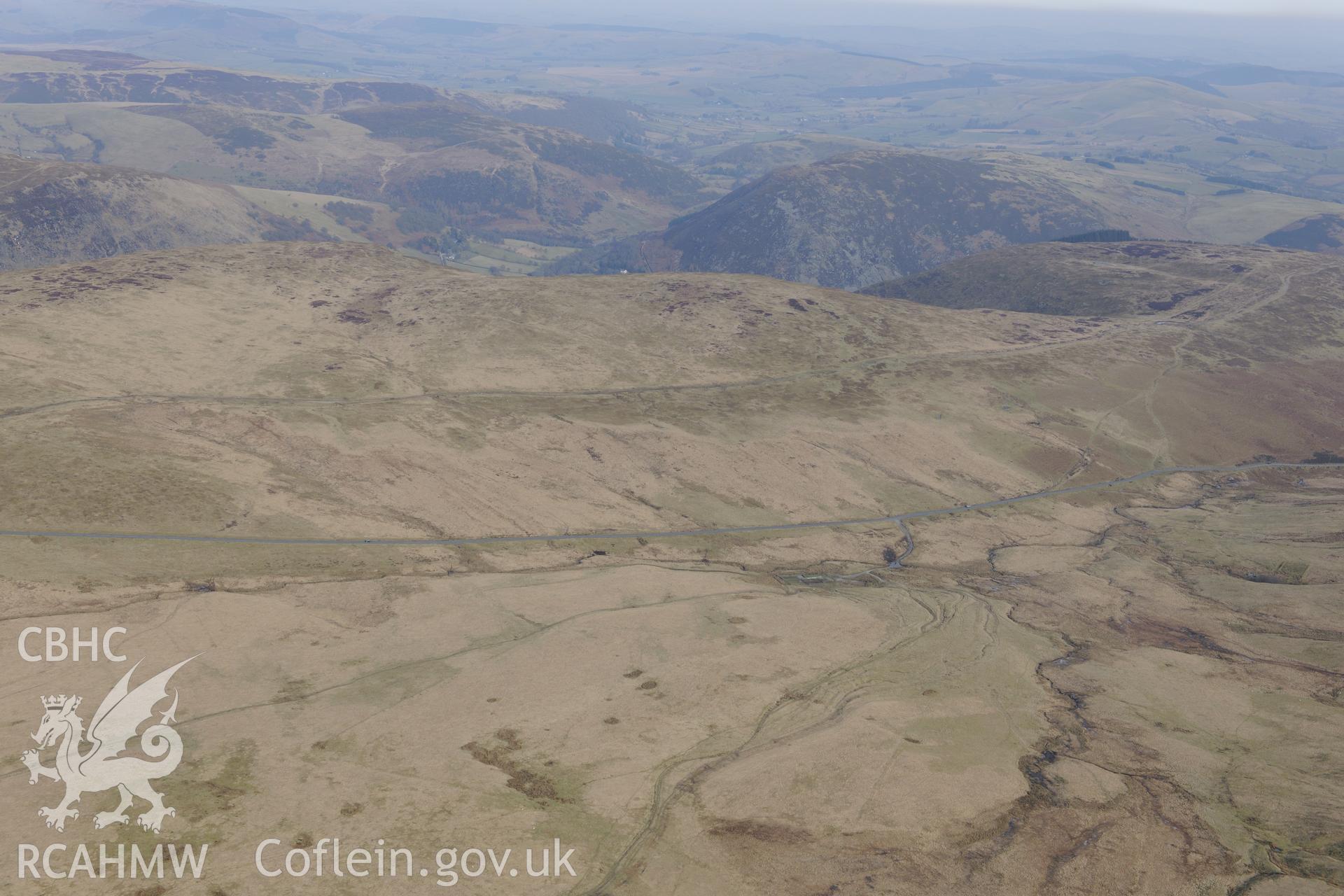 Esgair Perfedd marching camp and trackway, north west of Rhayader. Oblique aerial photograph taken during the Royal Commission?s programme of archaeological aerial reconnaissance by Toby Driver on 28th February 2013.