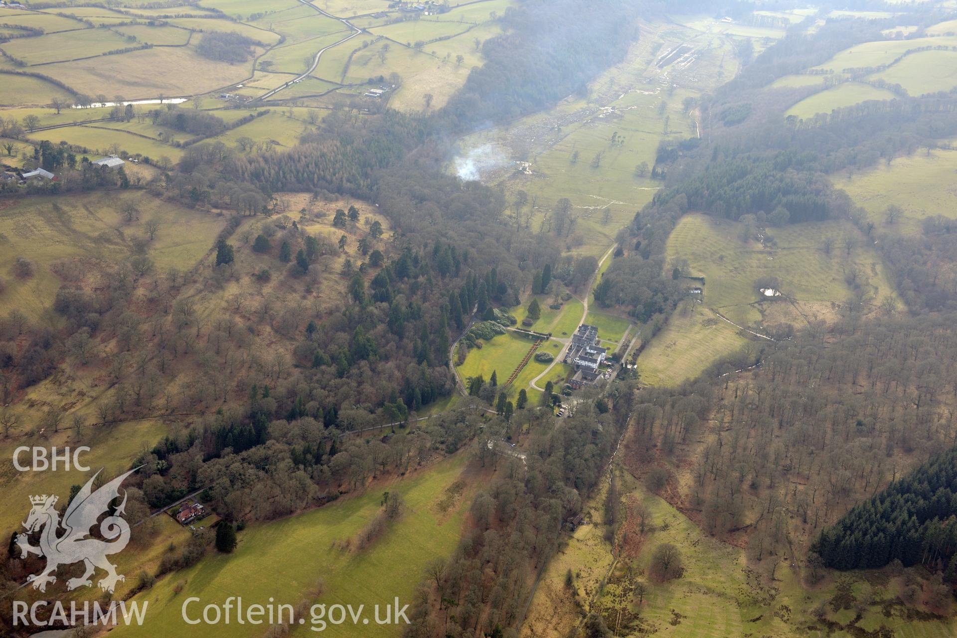 Gregynog Hall and Garden, Tregynon. Oblique aerial photograph taken during the Royal Commission?s programme of archaeological aerial reconnaissance by Toby Driver on 28th February 2013.