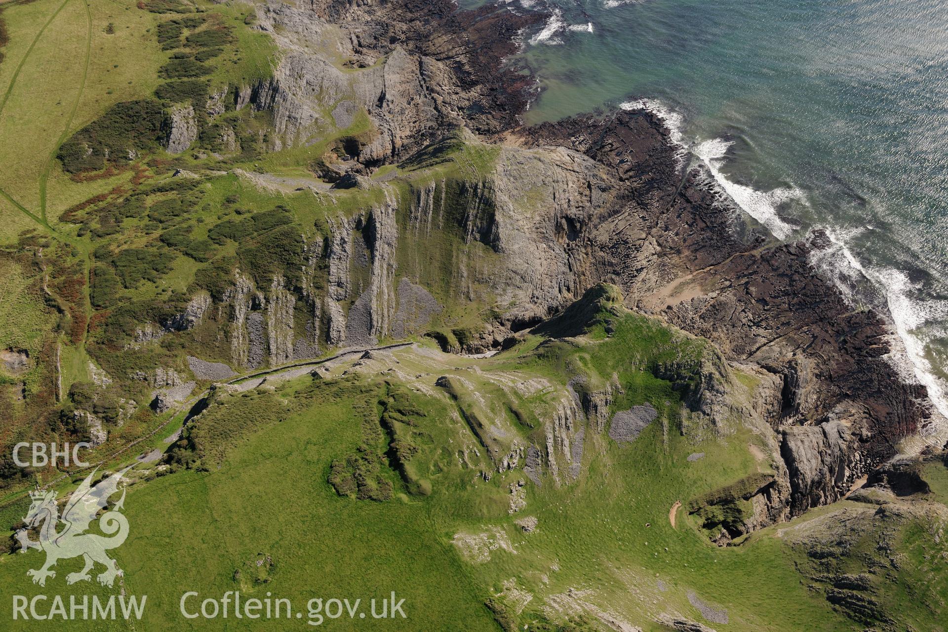 Yellow Top fort, on the south western shores of the Gower Peninsula. Oblique aerial photograph taken during the Royal Commission's programme of archaeological aerial reconnaissance by Toby Driver on 30th September 2015.