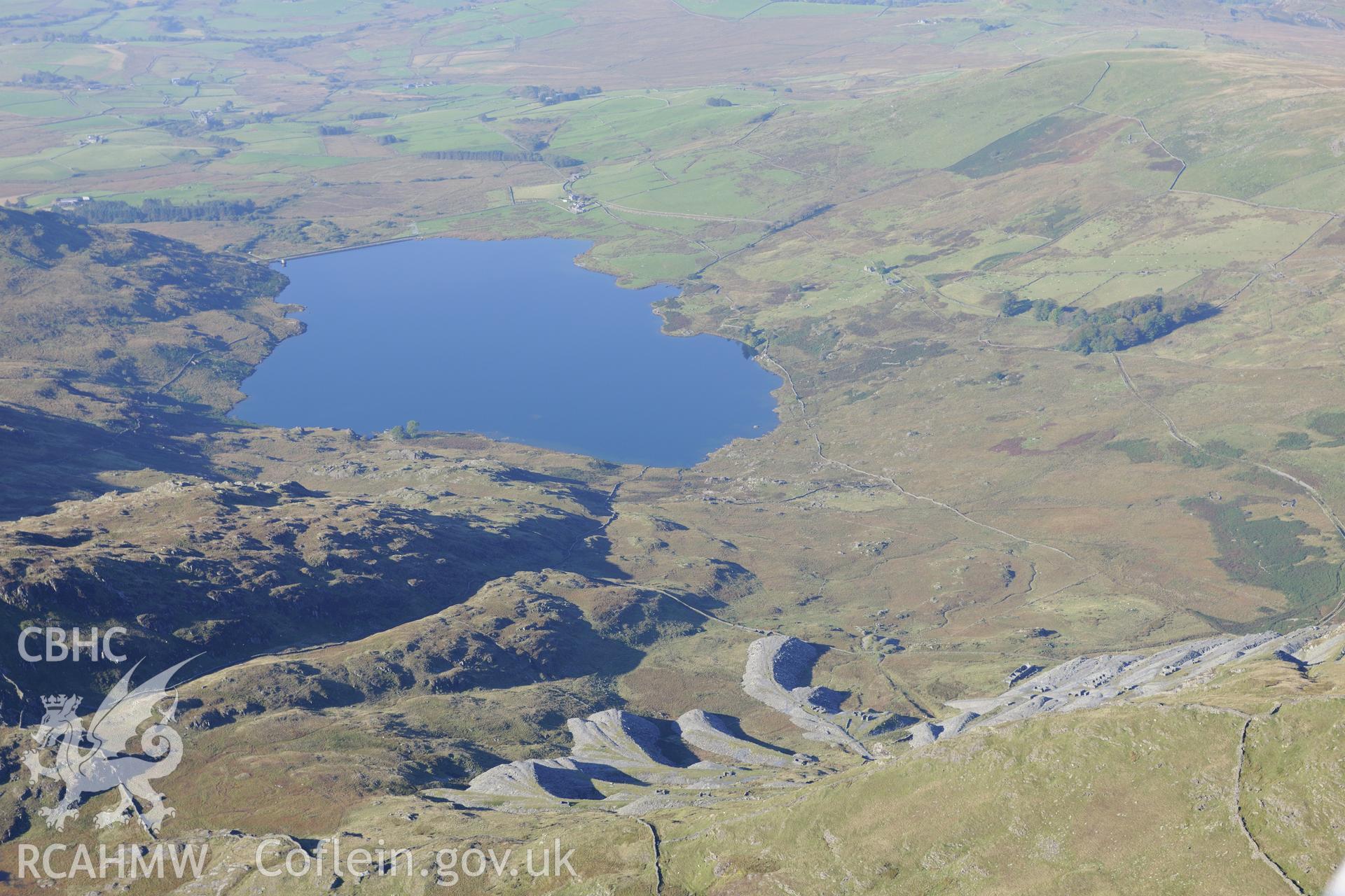 Gorseddau slate quarry and Llyn Cwmystradllyn reservoir, north of Porthmadog. Oblique aerial photograph taken during the Royal Commission's programme of archaeological aerial reconnaissance by Toby Driver on 2nd October 2015.