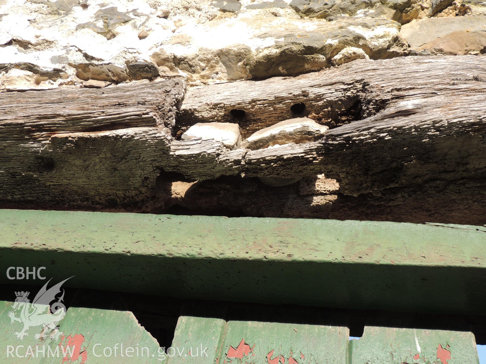 Detail of worked linted above main entrance. Photograph taken as part of archaeological building survey conducted at Bryn Gwylan Threshing Barn, Llangernyw, Conwy, carried out by Archaeology Wales, 2017-2018. Report no. 1640. Project no. 2578.