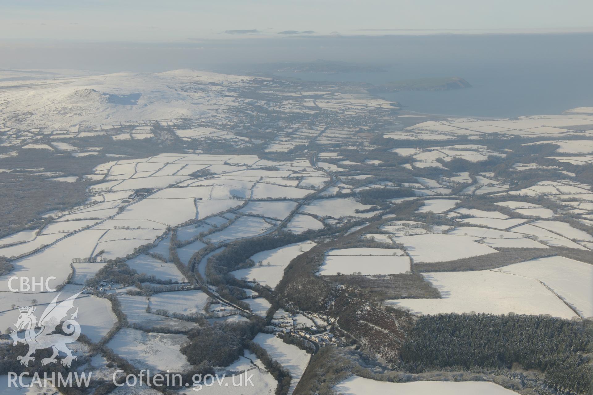 Felindre Farchog, south west of Cardigan. Oblique aerial photograph taken during the Royal Commission?s programme of archaeological aerial reconnaissance by Toby Driver on 24th January 2013.