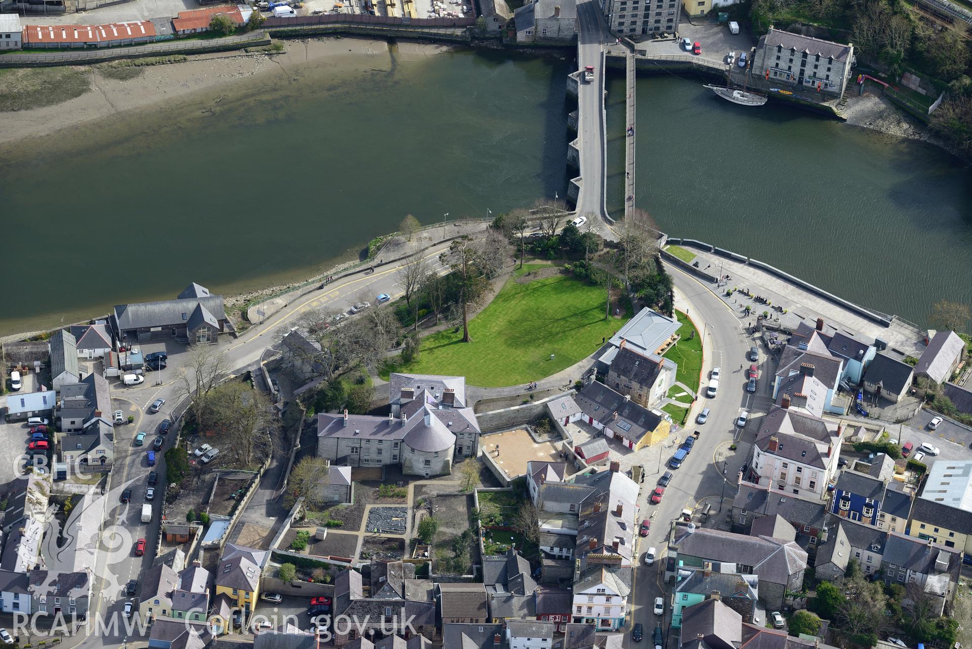 Cardigan Town, Castle, Castle House, Bridge, Harbour and Old Shire Hall. Oblique aerial photograph taken during the Royal Commission's programme of archaeological aerial reconnaissance by Toby Driver 15th April 2015.