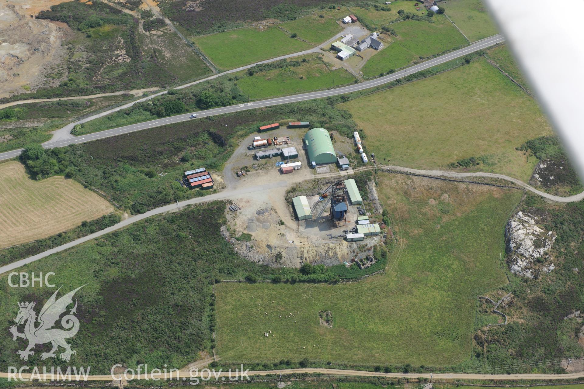 Parys Mountain copper mines, Amlwch, Anglesey. Oblique aerial photograph taken during the Royal Commission?s programme of archaeological aerial reconnaissance by Toby Driver on 12th July 2013.