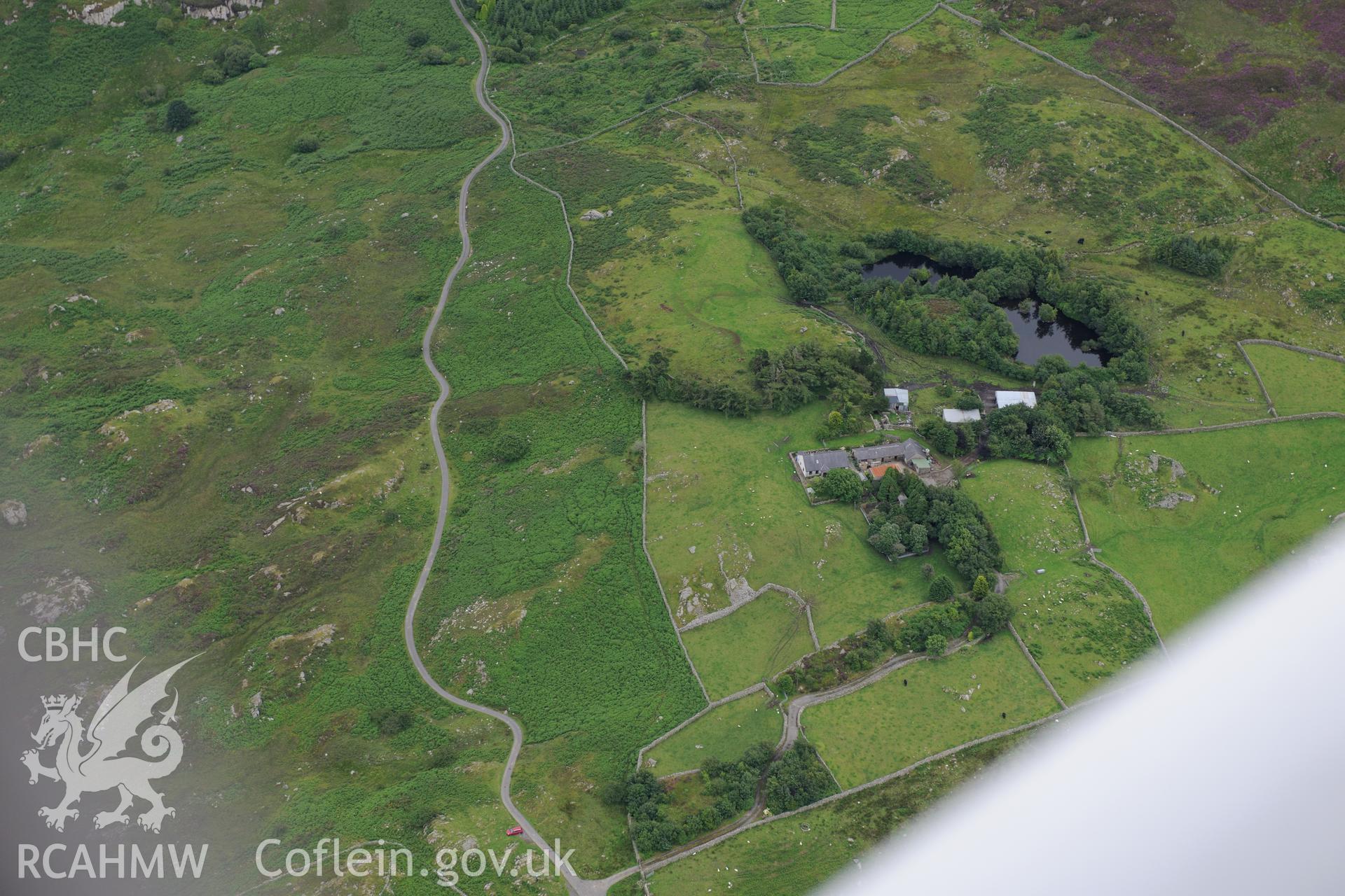 Huts near Gallt y Celyn. Oblique aerial photograph taken during the Royal Commission's programme of archaeological aerial reconnaissance by Toby Driver on 30th July 2015.