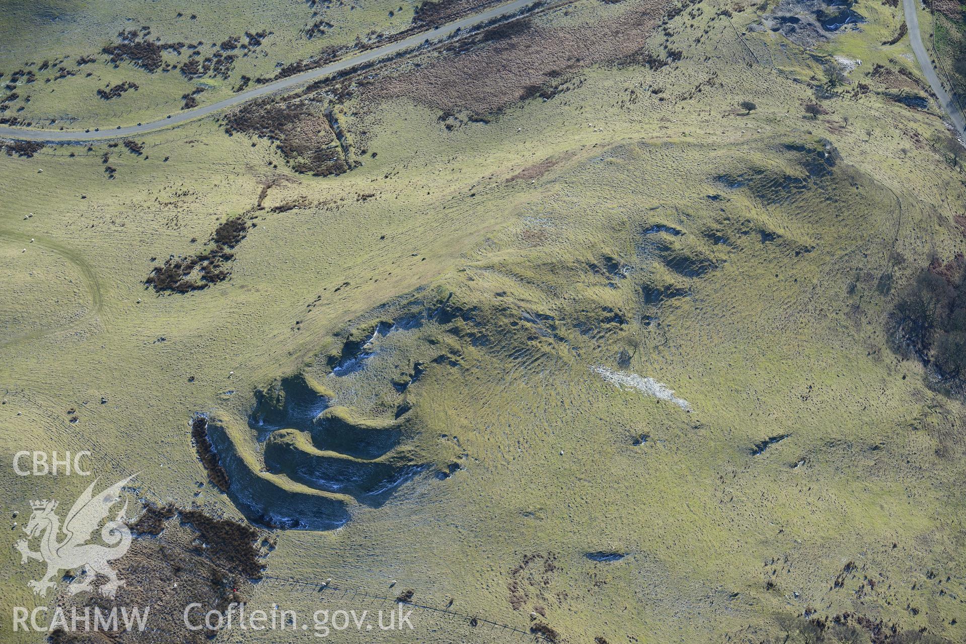 Pen-y-Bannau hillfort and the ridge and furrow surrounding it, near Strata Florida, Pontrhydfendigaid. Oblique aerial photograph taken during the Royal Commission's programme of archaeological aerial reconnaissance by Toby Driver on 4th February 2015.