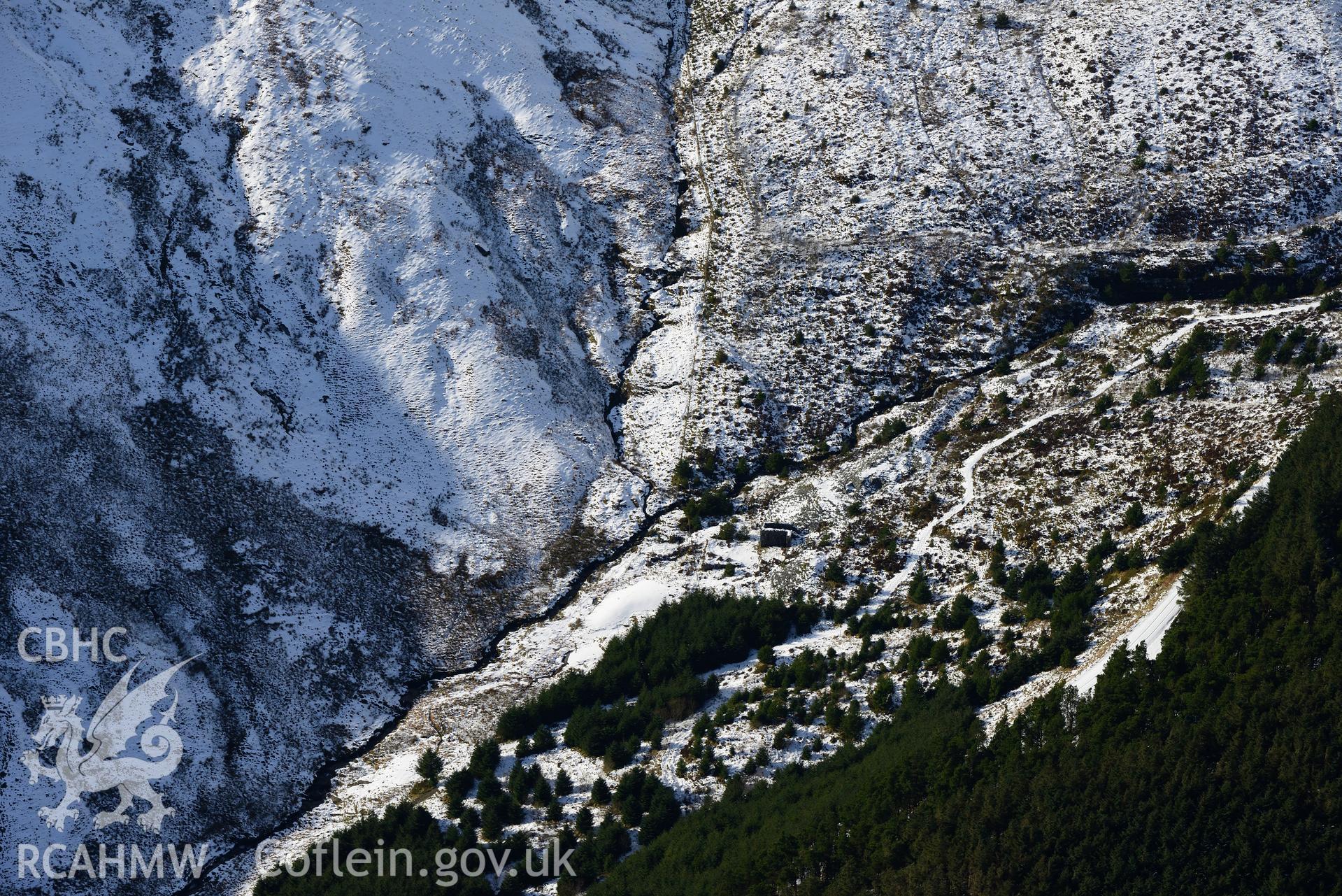 Nant-yr-Eira mine, on the western edge of Hafren Forest, near Llanidloes. Oblique aerial photograph taken during the Royal Commission's programme of archaeological aerial reconnaissance by Toby Driver on 4th February 2015.