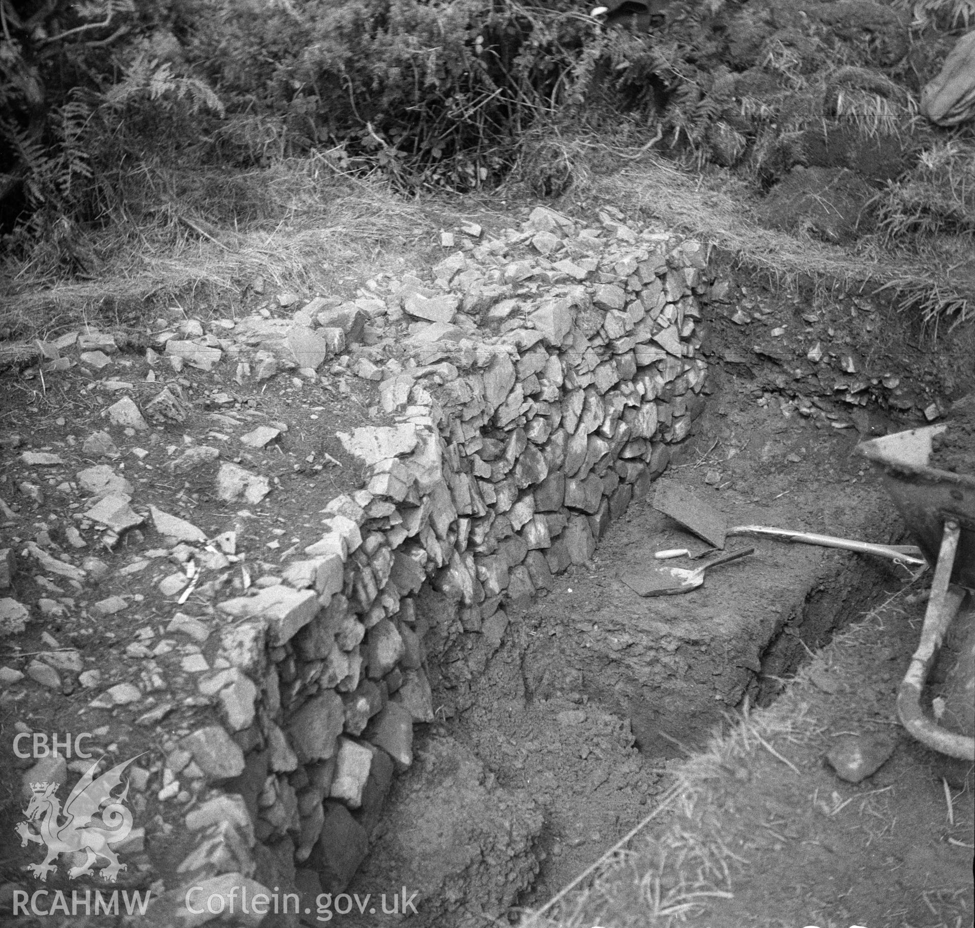 Digital copy of a nitrate negative showing excavation at Knock Rath, Clarbeston, 1963.