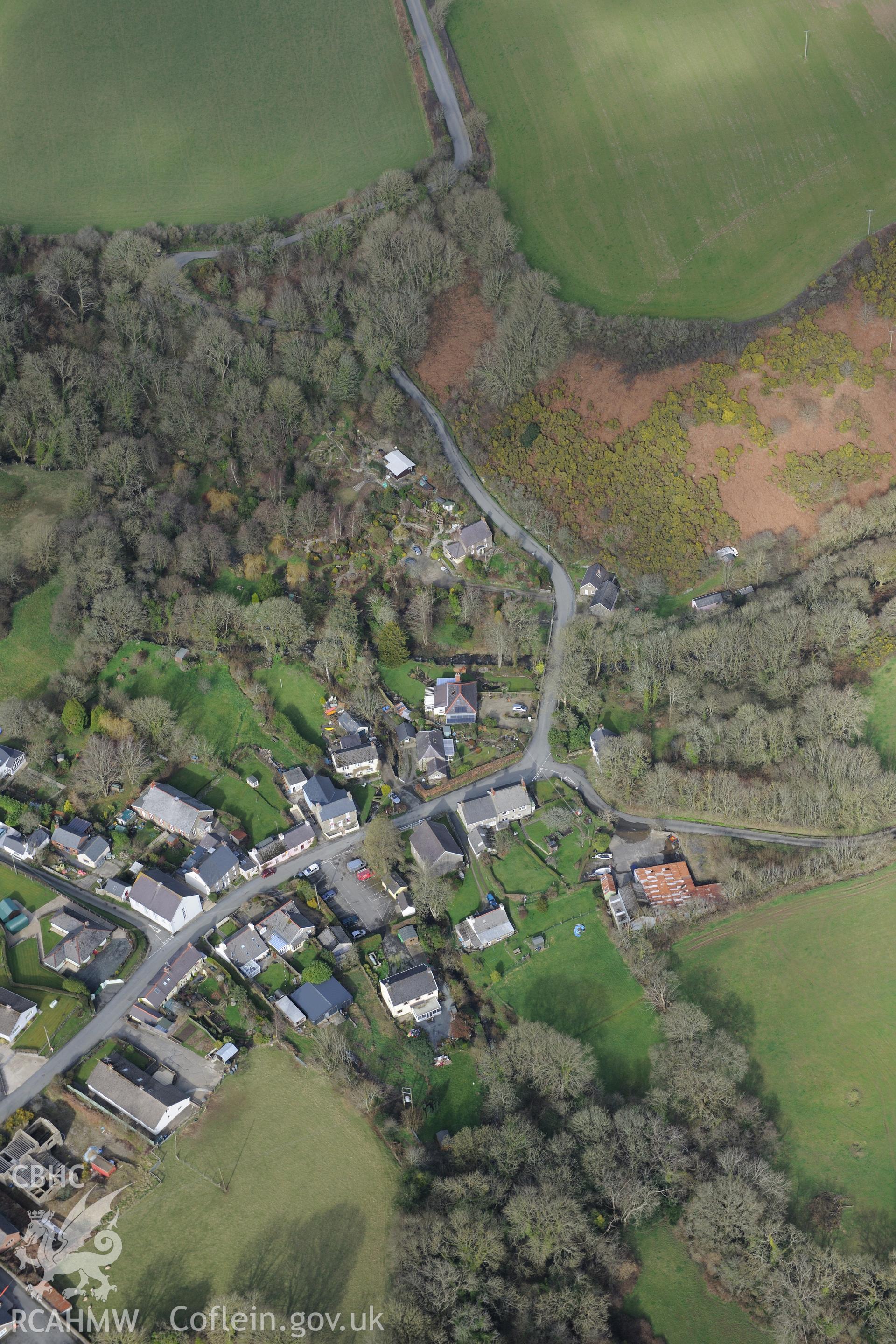 The village of Moylgrove. Oblique aerial photograph taken during the Royal Commission's programme of archaeological aerial reconnaissance by Toby Driver on 13th March 2015.