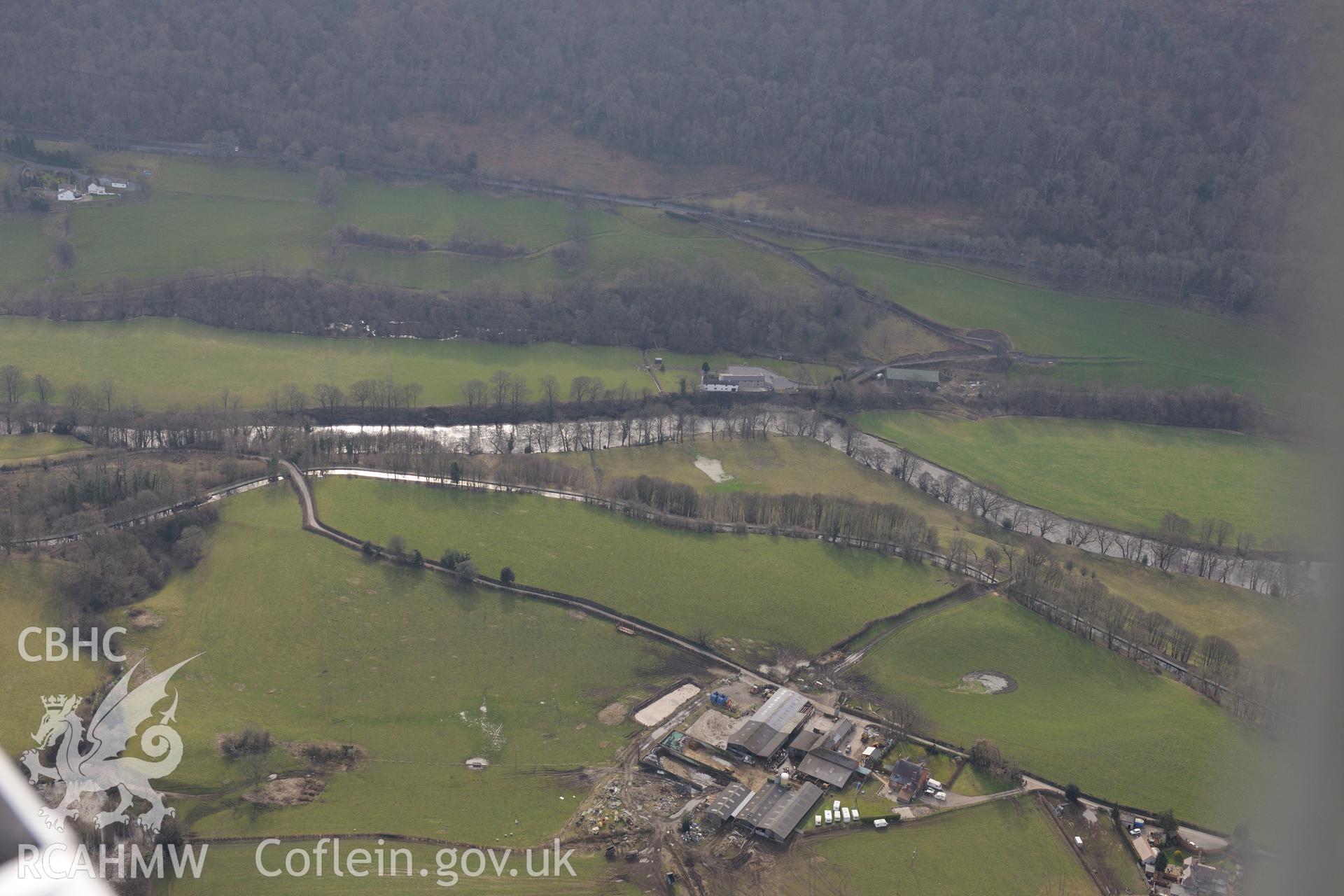 Millars Bridge no. 35, crossing the Llangollen canal west of Froncysyllte. Oblique aerial photograph taken during the Royal Commission?s programme of archaeological aerial reconnaissance by Toby Driver on 28th February 2013.