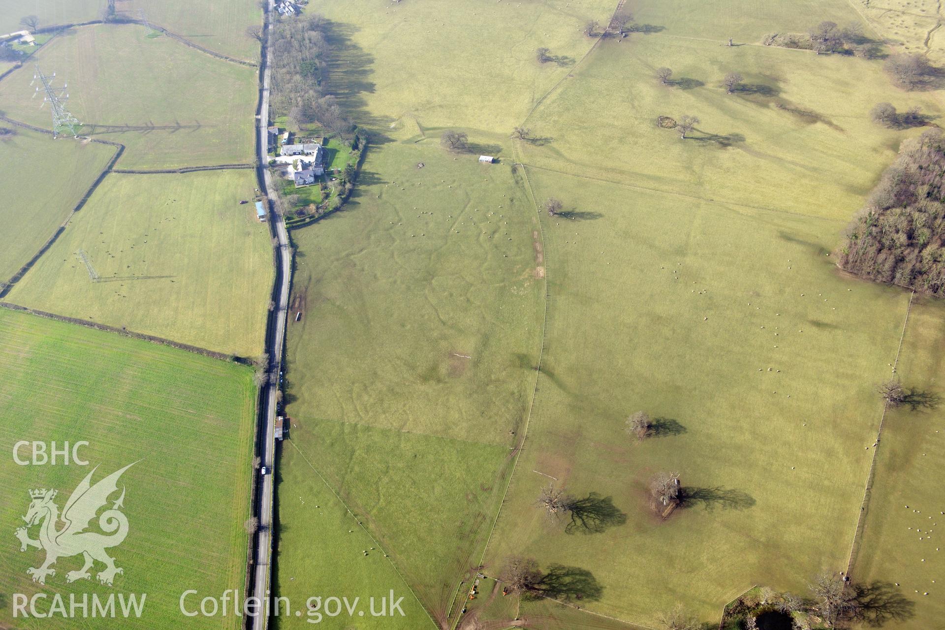 The south-eastern group of Bodelwyddan Park army practise trenches, at Bryn-Celyn, west of St. Asaph. Oblique aerial photograph taken during the Royal Commission?s programme of archaeological aerial reconnaissance by Toby Driver on 28th February 2013.