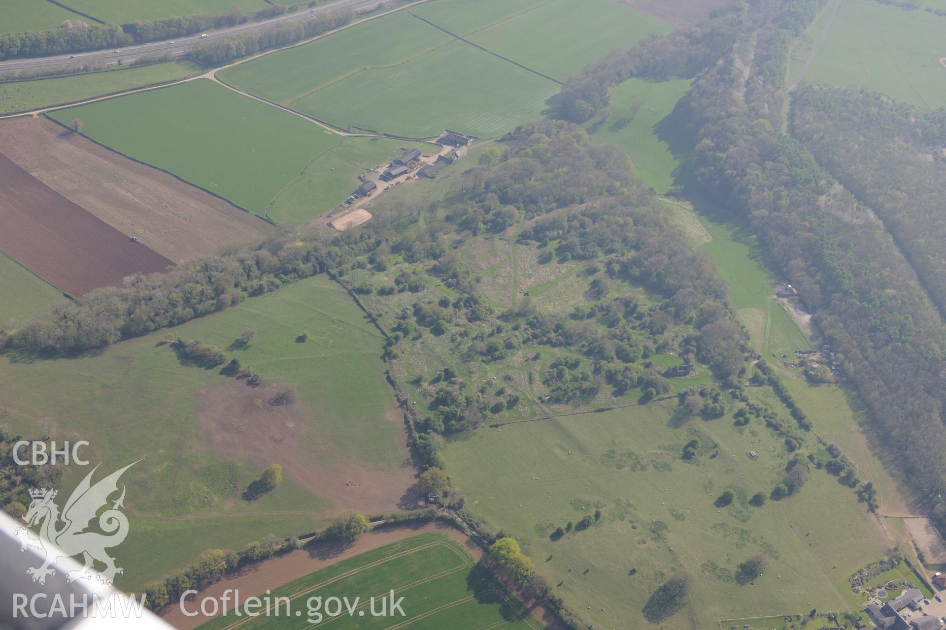 Runston chapel, manor house, farm barn, building complex and medieval village. Oblique aerial photograph taken during the Royal Commission's programme of archaeological aerial reconnaissance by Toby Driver on 21st April 2015