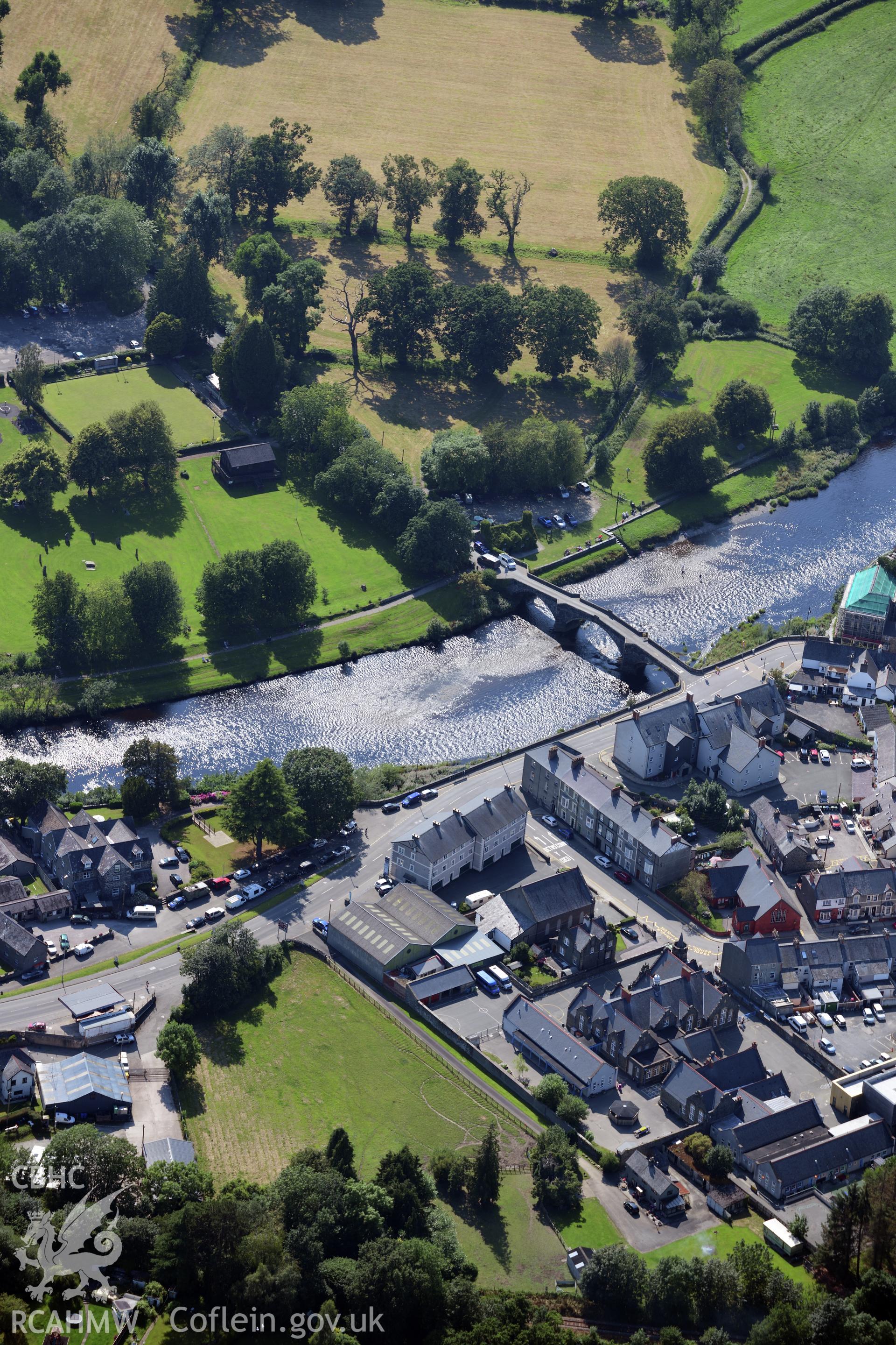 The town of Llanrwst, with Pont Fawr crossing the river Conwy. Oblique aerial photograph taken during the Royal Commission?s programme of archaeological aerial reconnaissance by Toby Driver on 23rd July 2019.