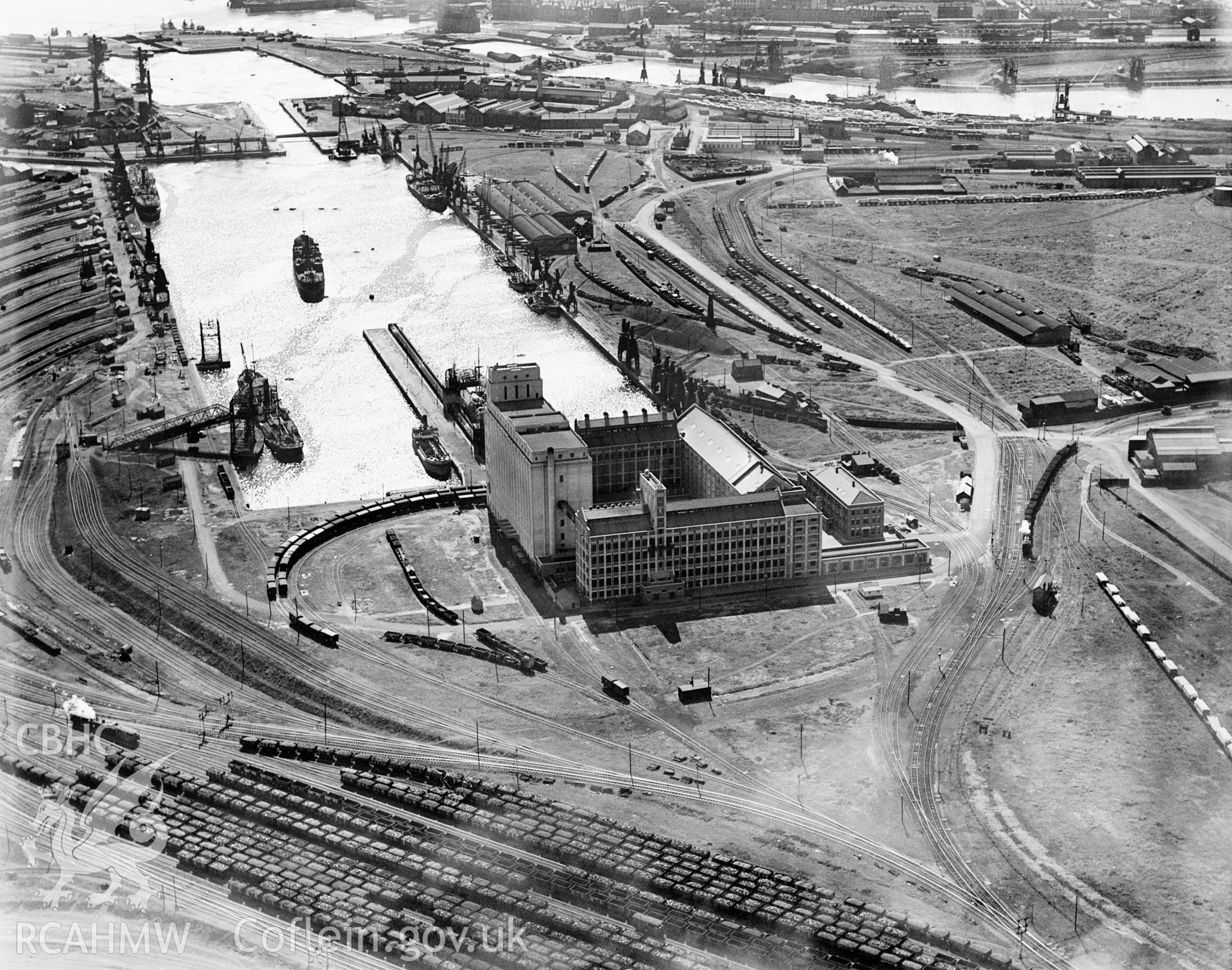 View of Spillers Ltd., Cardiff, oblique aerial view. 5?x4? black and white glass plate negative.