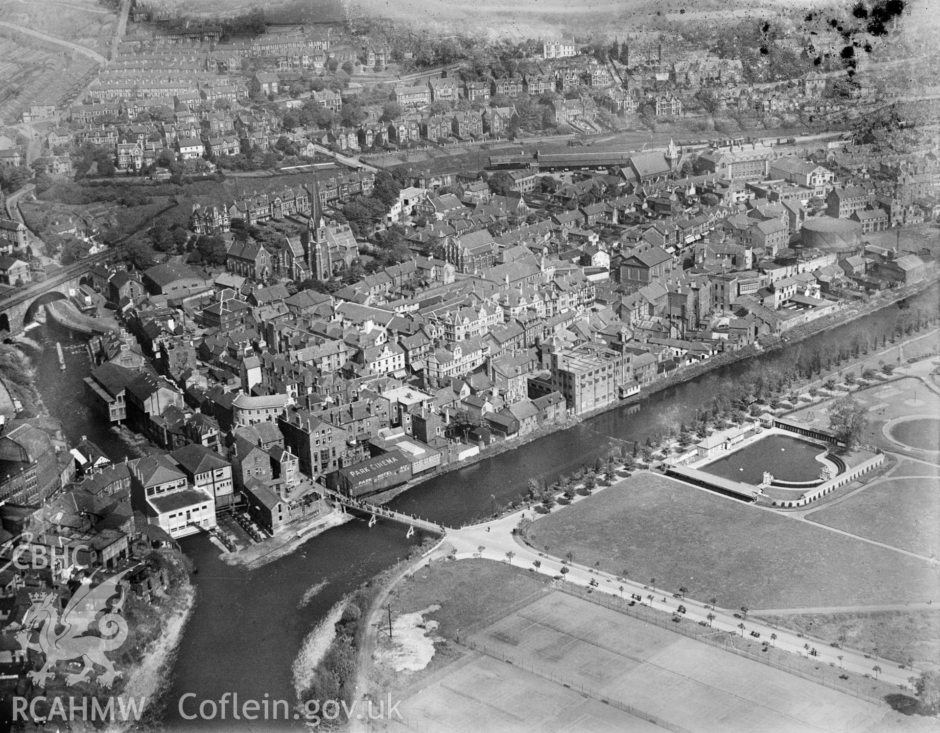 View of Pontypridd showing Ynysangharad Park and swimming pool, oblique aerial view. 5?x4? black and white glass plate negative.