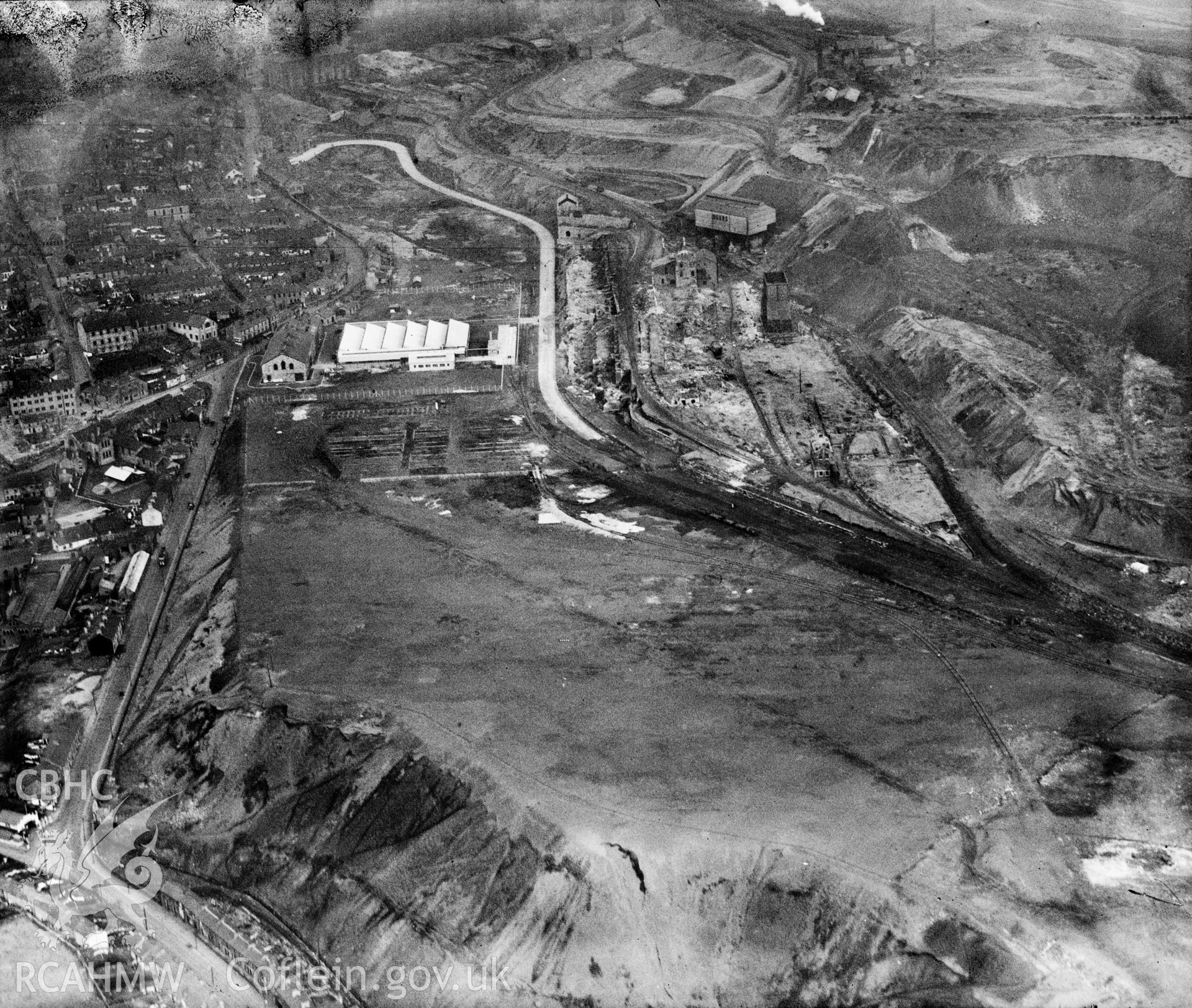 View of Dowlais Ironworks showing Dowlais great tip, oblique aerial view. 5?x4? black and white glass plate negative.