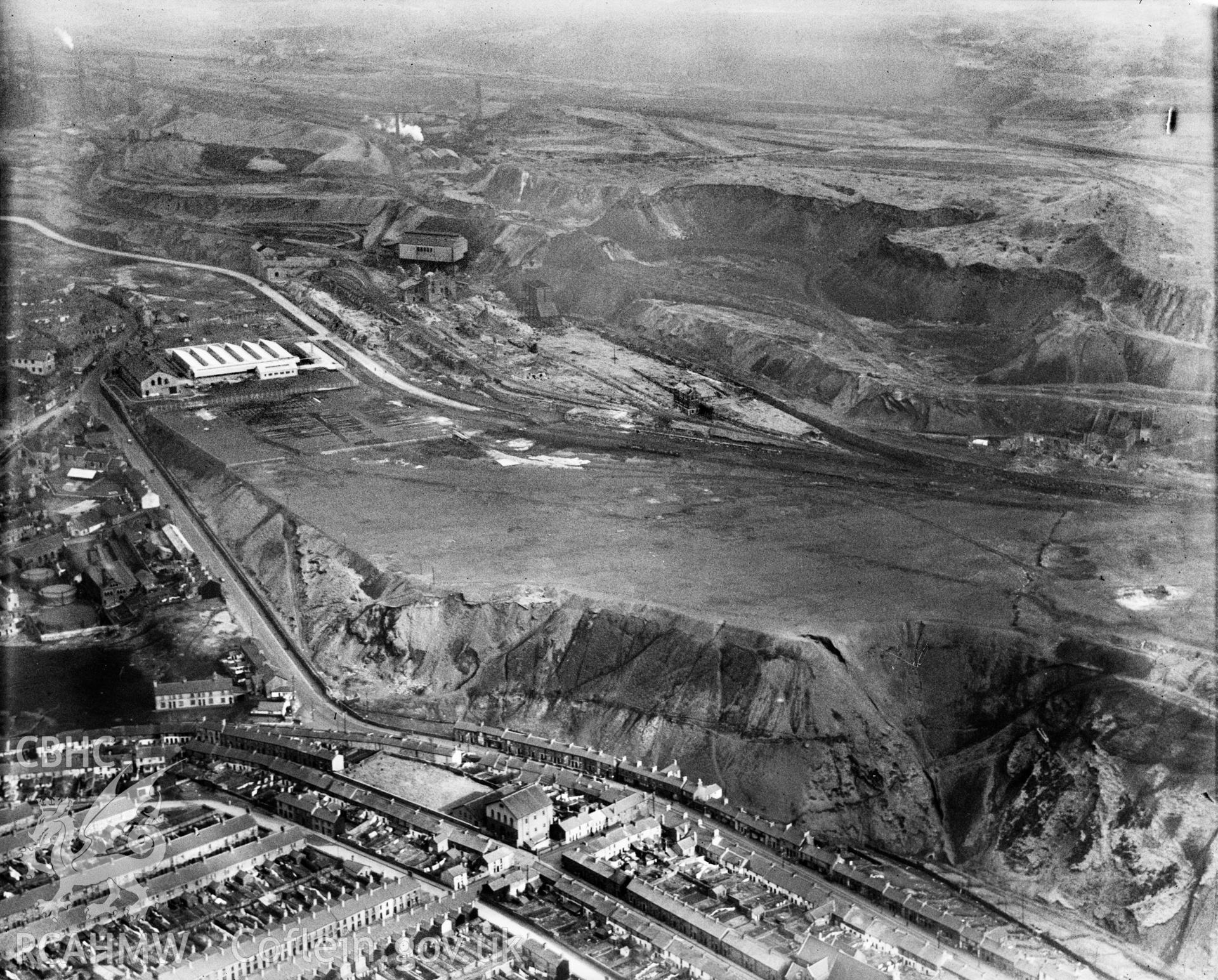 View of Dowlais Ironworks showing Dowlais great tip, oblique aerial view. 5?x4? black and white glass plate negative.