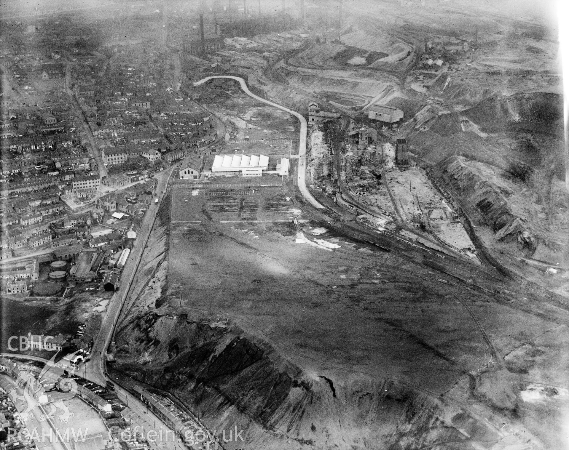 View of Dowlais Ironworks showing Dowlais great tip, oblique aerial view. 5?x4? black and white glass plate negative.