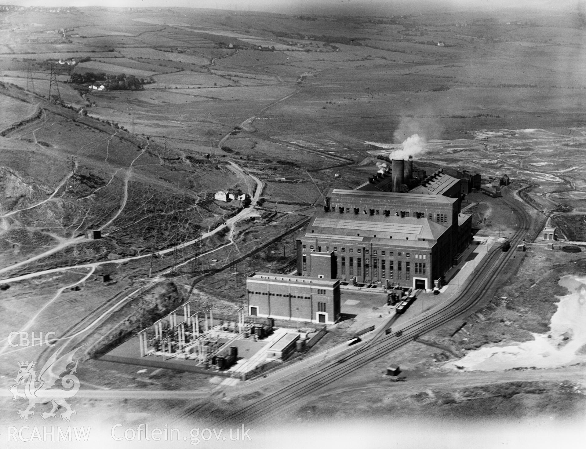 View of Tir John power station, Swansea (A.R.P. County Borough of Swansea), oblique aerial view. 5?x4? black and white glass plate negative.