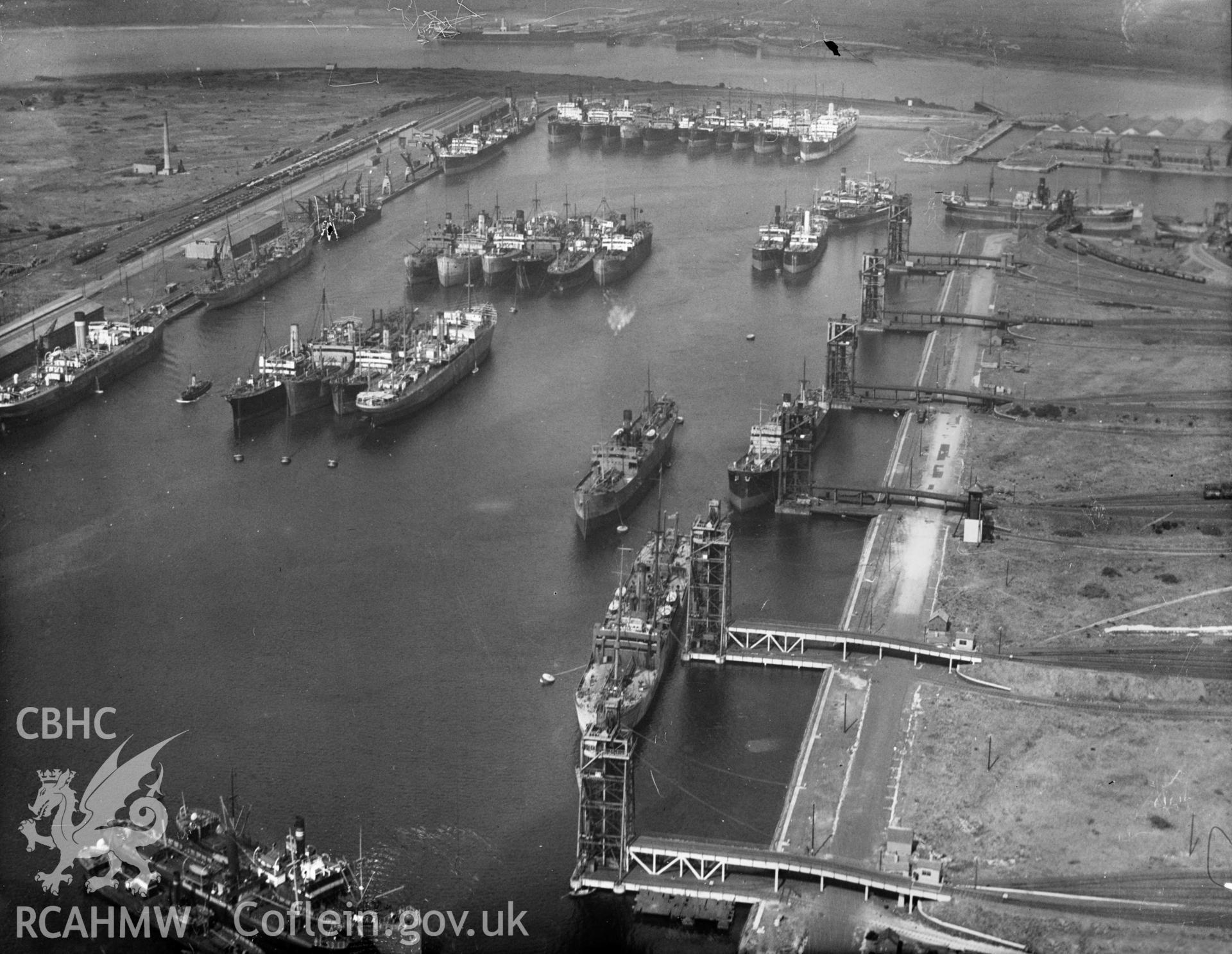 View of Newport South dock with steam ships, oblique aerial view. 5?x4? black and white glass plate negative.