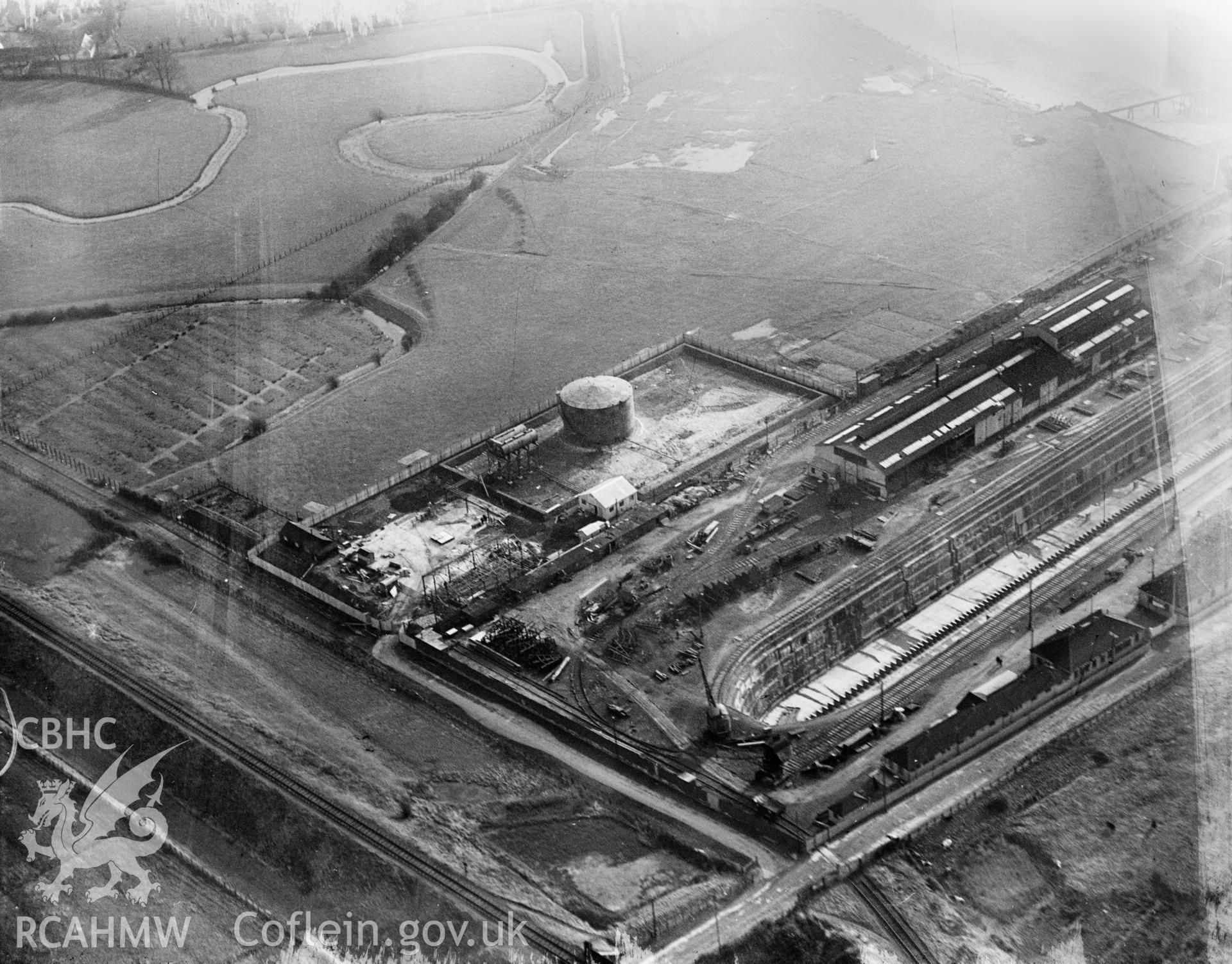 View of British Oil Storage Co., Union Dry Dock, Newport, oblique aerial view. 5?x4? black and white glass plate negative.