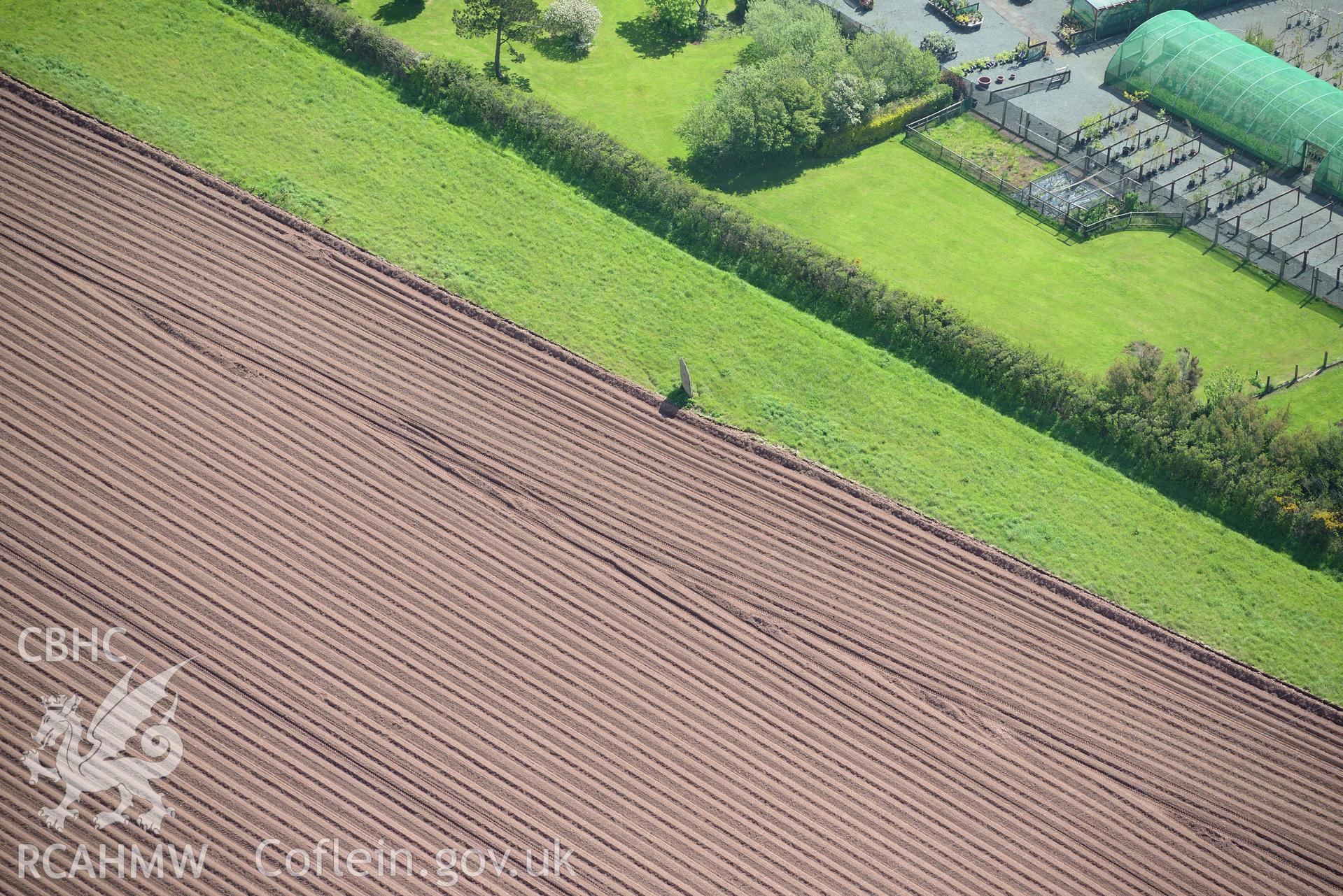 Longstone standing stone near Mabesgate, St. Ishmaels. Oblique aerial photograph taken during the Royal Commission's programme of archaeological aerial reconnaissance by Toby Driver on 15th May 2015.