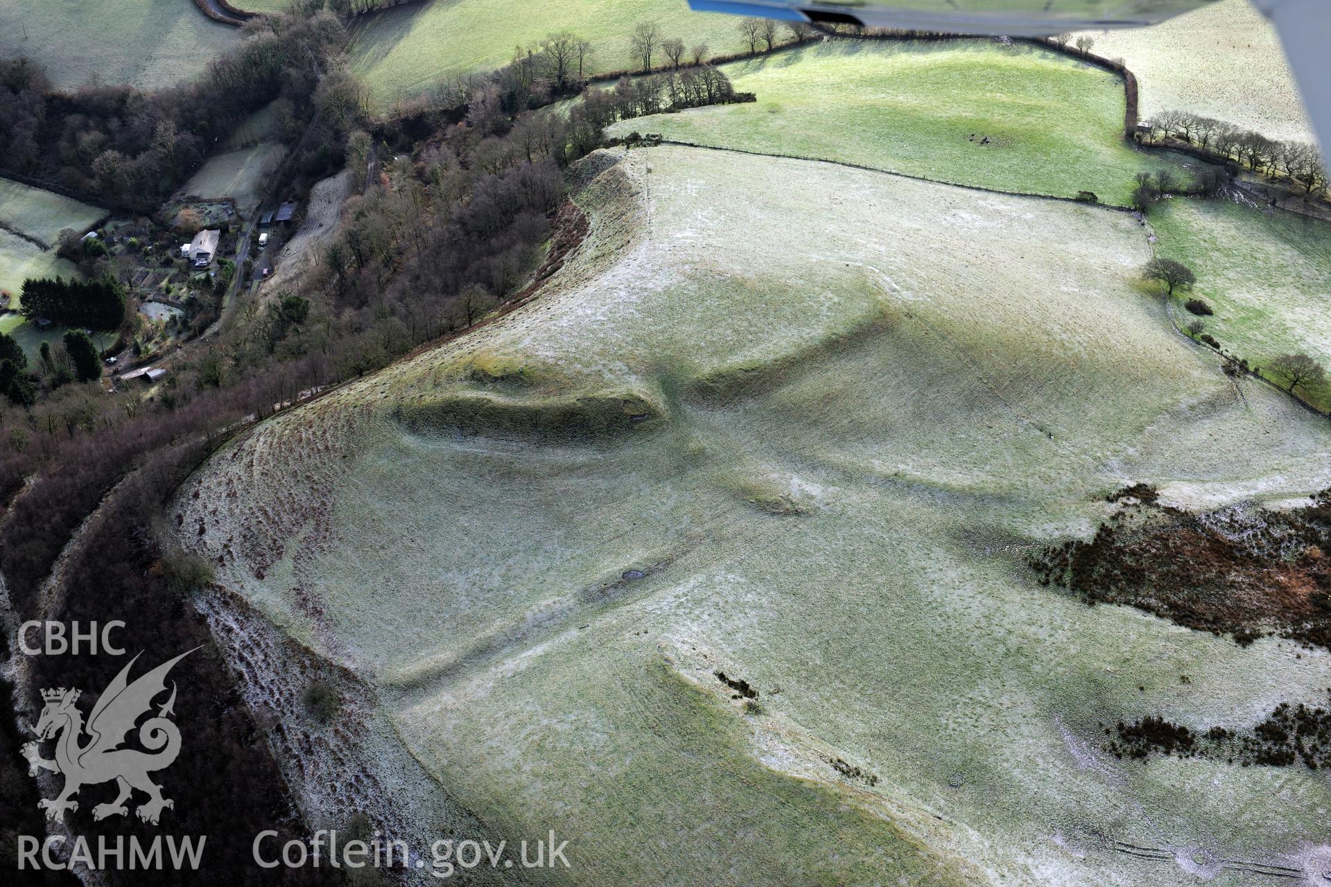 Y Fan hillfort, Llansadwrn, south west of Llandovery. Oblique aerial photograph taken during the Royal Commission?s programme of archaeological aerial reconnaissance by Toby Driver on 15th January 2013.