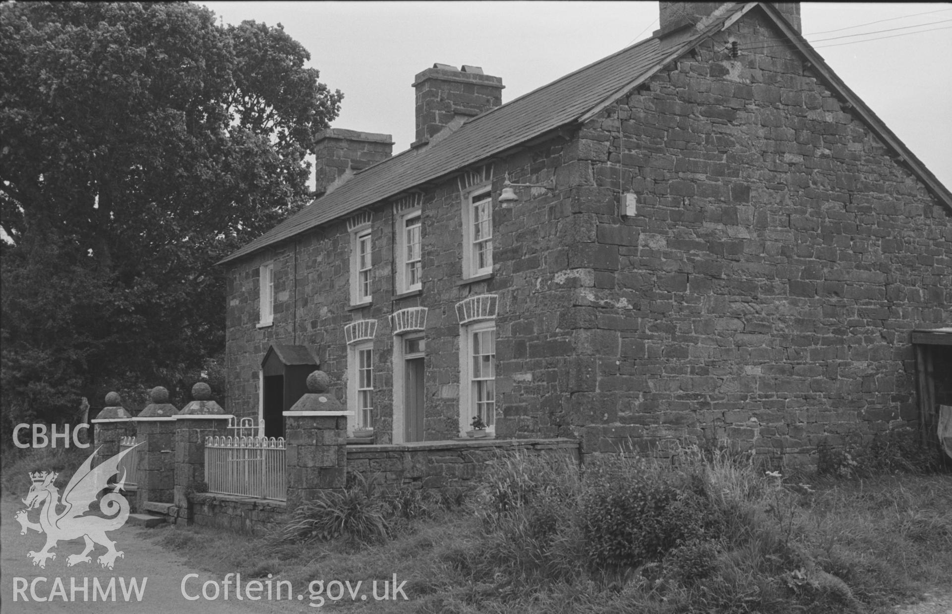 Digital copy of a black and white negative showing houses 150m along Cwmsaeson road at Oakford, Derwen Gam, Aberaeron. Photographed by Arthur O. Chater on 5th September 1966 looking east from the crossroads at SN 453 581.