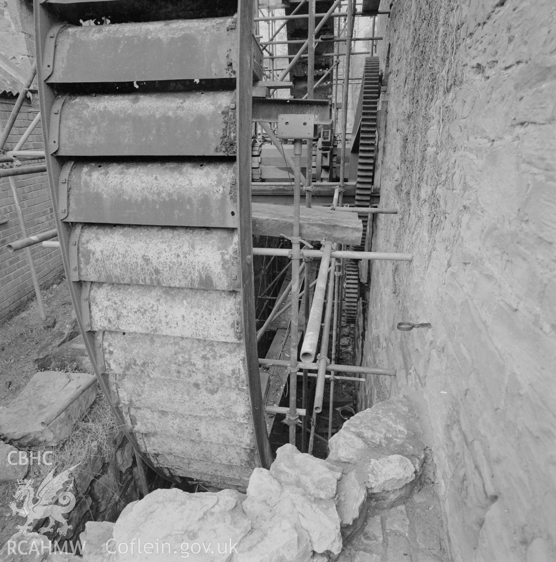 Digital copy of a black and white negative showing the waterwheel at Trevor Old Mill taken by RCAHMW, 1987.