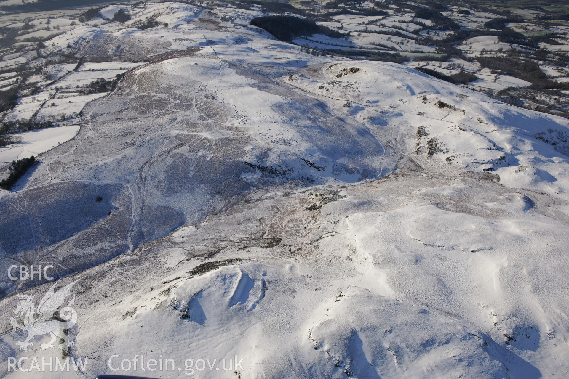 Cwm Berwyn defended enclosure, Glascwm, north east of Builth Wells. Oblique aerial photograph taken during the Royal Commission?s programme of archaeological aerial reconnaissance by Toby Driver on 15th January 2013.