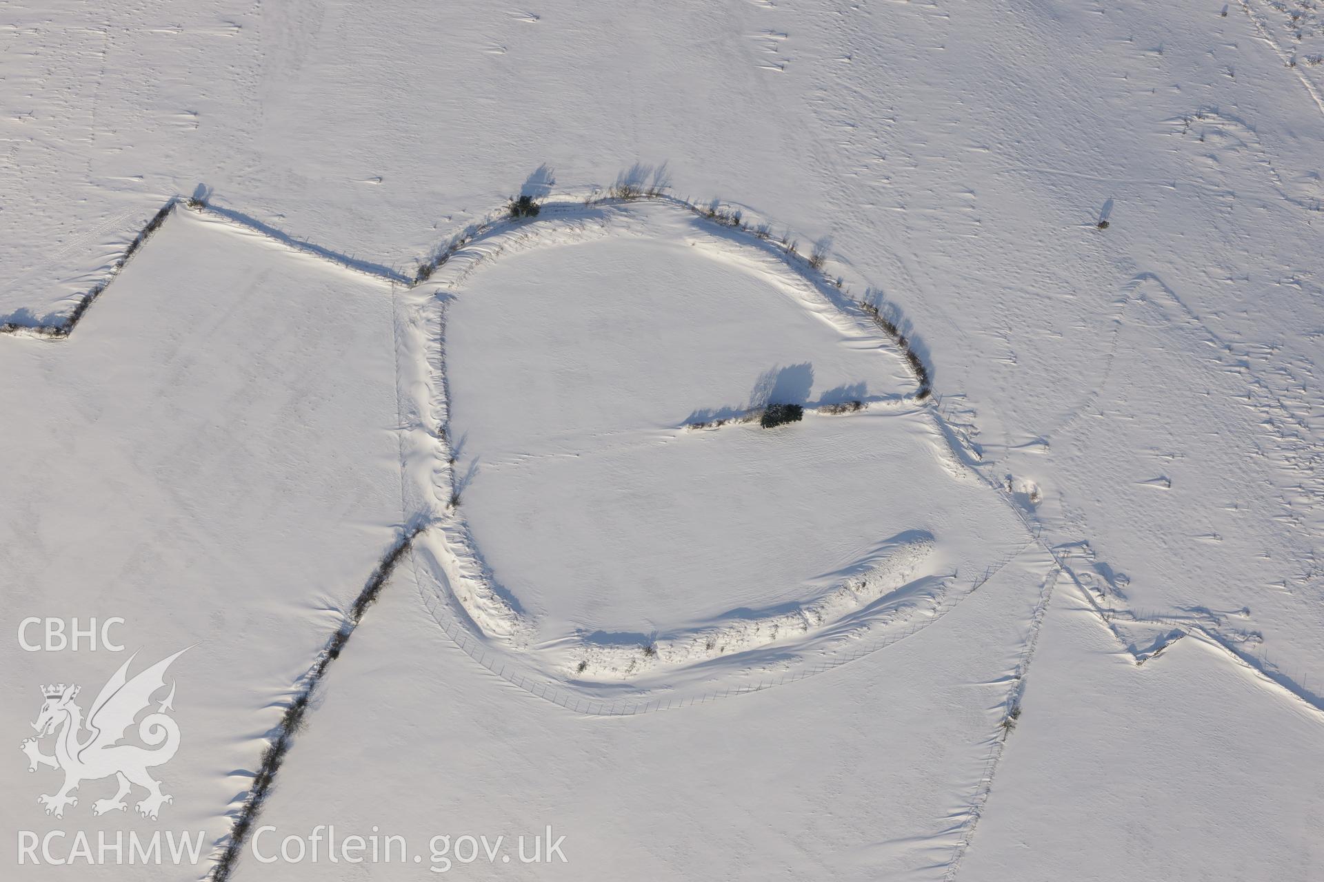 Coedcae Gaer hillfort, north east of Bridgend. Oblique aerial photograph taken during the Royal Commission?s programme of archaeological aerial reconnaissance by Toby Driver on 24th January 2013.