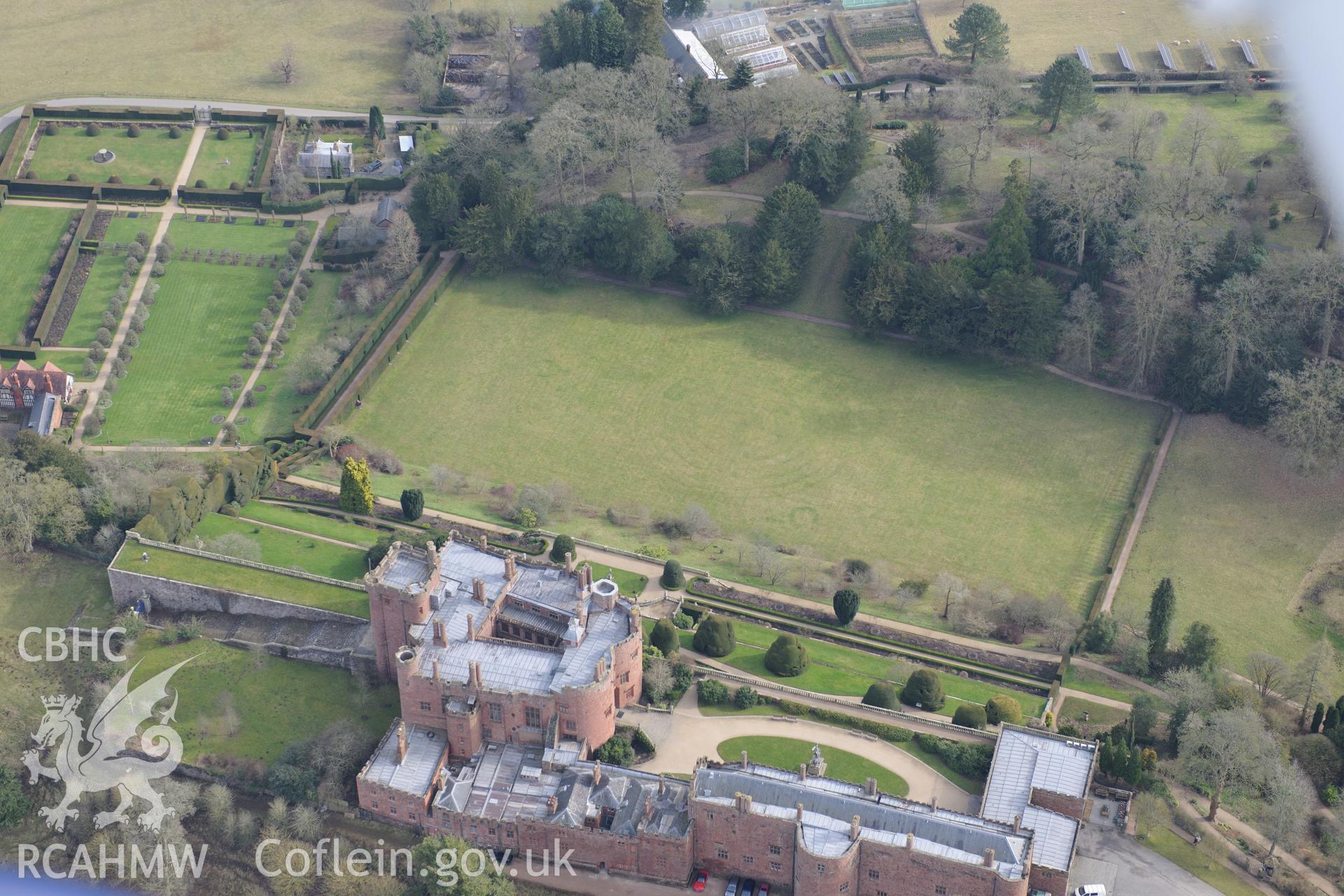 Powis Castle and its associated park and gardens, Welshpool. Oblique aerial photograph taken during the Royal Commission?s programme of archaeological aerial reconnaissance by Toby Driver on 28th February 2013.