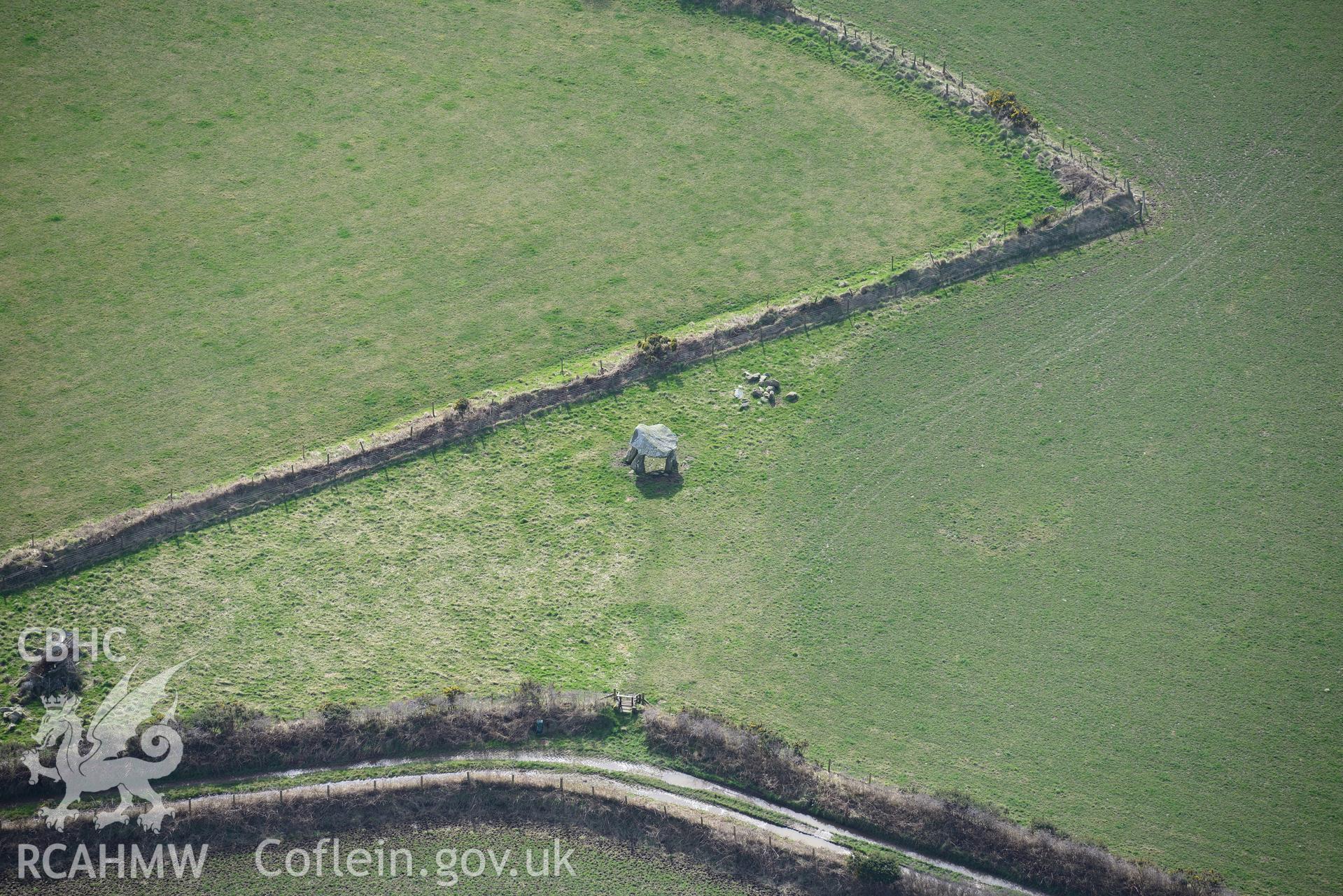 Llech-y-Drybedd chambered tomb, near Moylgrove, Cardigan. Oblique aerial photograph taken during the Royal Commission's programme of archaeological aerial reconnaissance by Toby Driver on 13th March 2015.