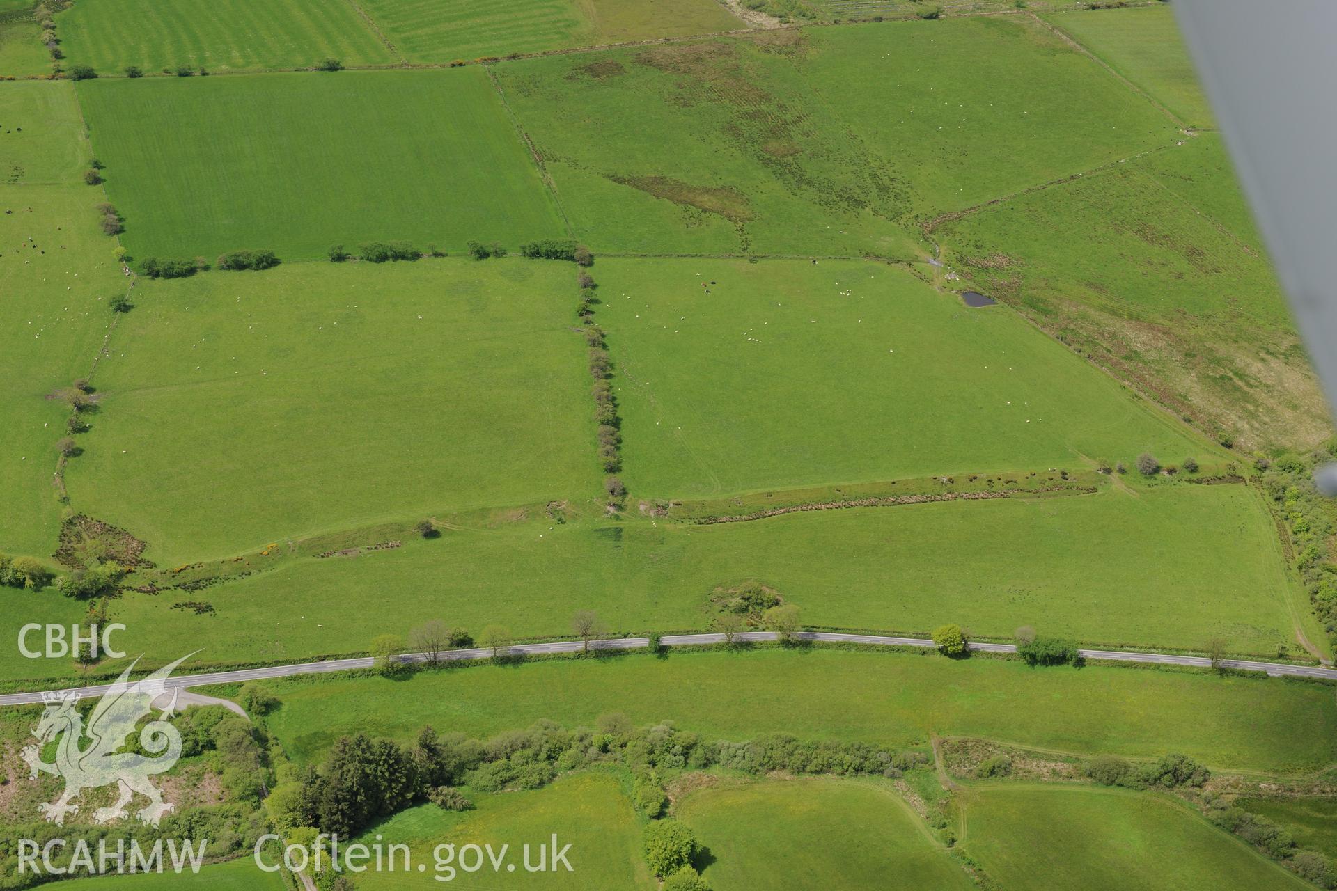 Clawdd Mawr. Oblique aerial photograph taken during the Royal Commission?s programme of archaeological aerial reconnaissance by Toby Driver on 3rd June 2015.