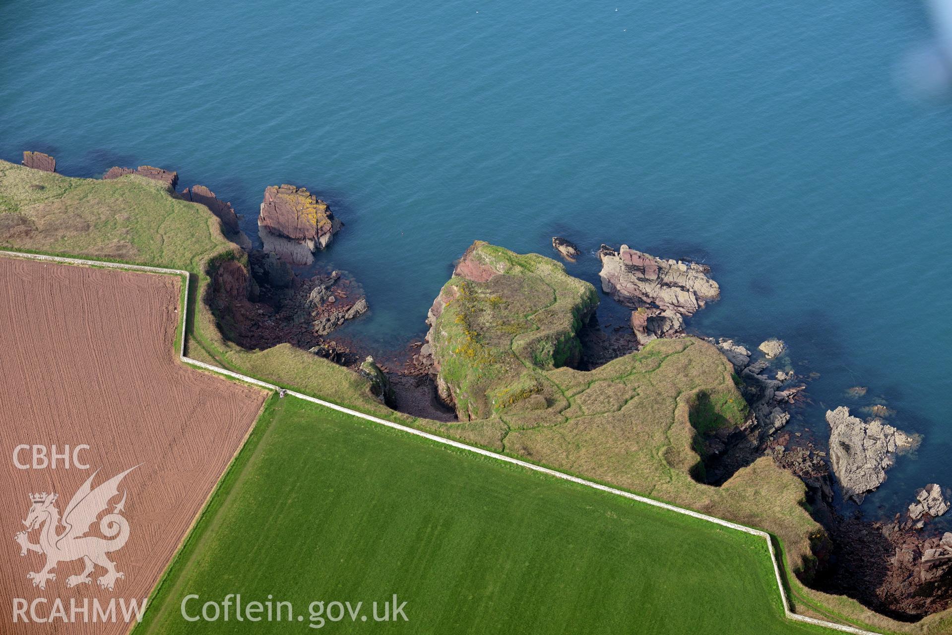 Aerial photography of Castle Head promontory fort taken on 27th March 2017. Baseline aerial reconnaissance survey for the CHERISH Project. ? Crown: CHERISH PROJECT 2017. Produced with EU funds through the Ireland Wales Co-operation Programme 2014-2020. All material made freely available through the Open Government Licence.