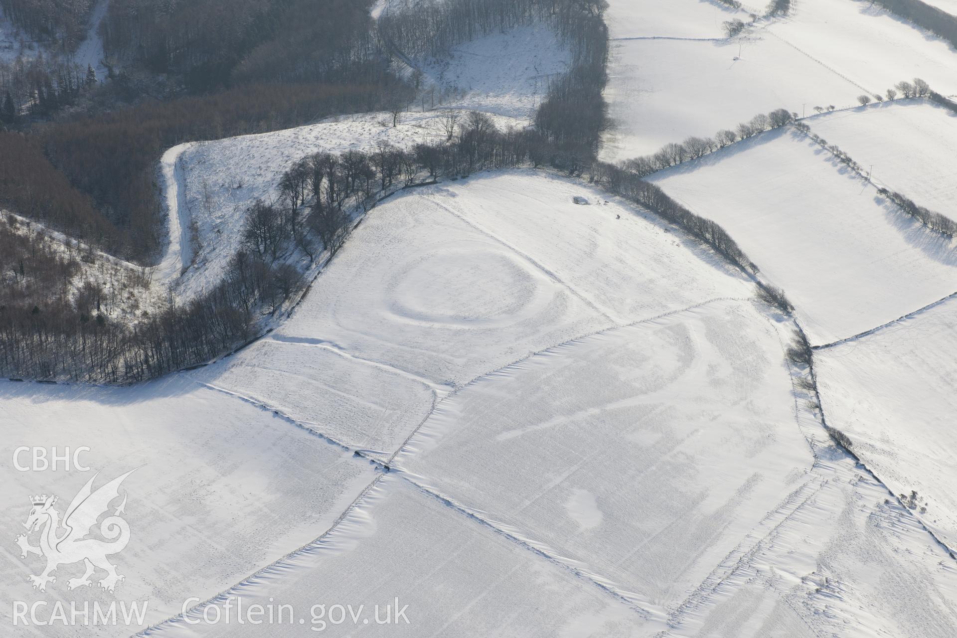 Ton Mawr enclosure, east of Margam, Port Talbot. Oblique aerial photograph taken during the Royal Commission?s programme of archaeological aerial reconnaissance by Toby Driver on 24th January 2013.