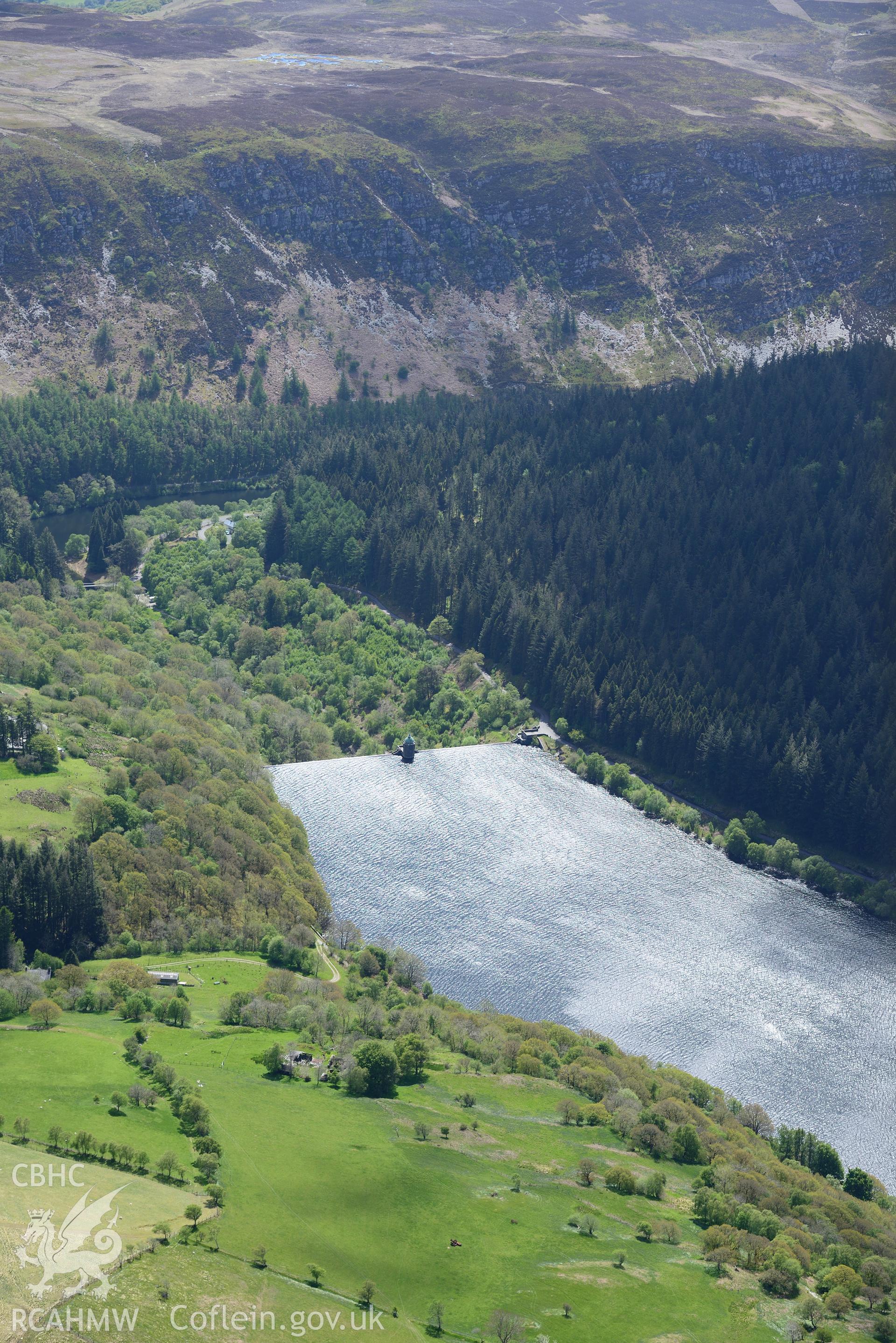 Pen-y-Garreg reservoir, dam and valve tower. Oblique aerial photograph taken during the Royal Commission's programme of archaeological aerial reconnaissance by Toby Driver on 3rd June 2015.