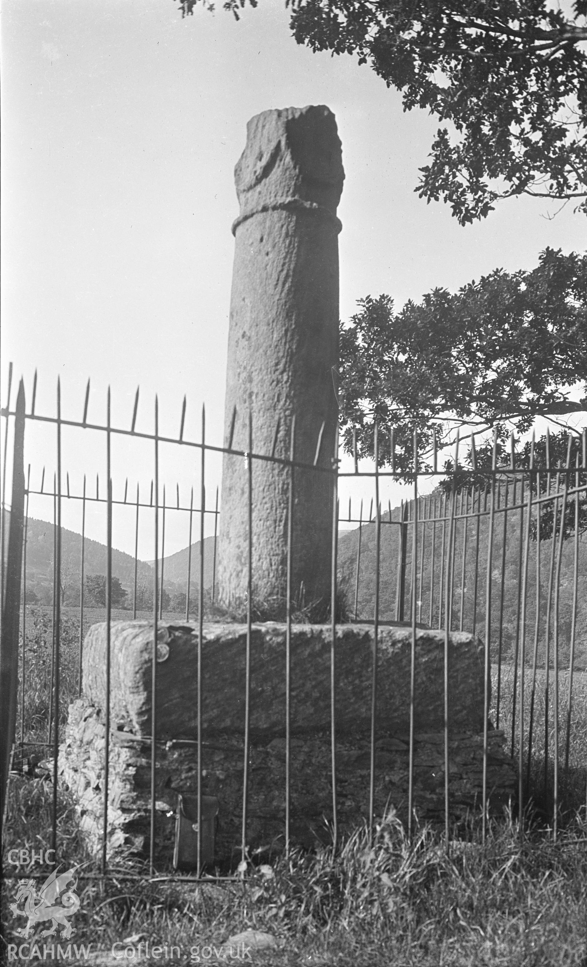 Digital copy of a nitrate negative showing a general view of Eliseg's Pillar, taken by Leonard Monroe, undated.