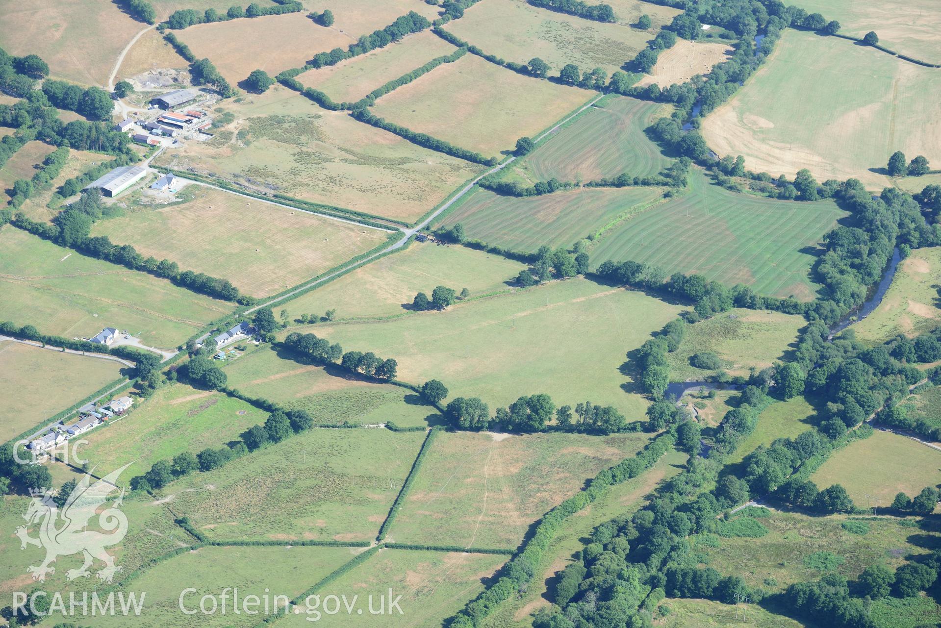 Royal Commission aerial photography of parchmarks of the Roman road approaching Llanfair Clydogau, taken on 19th July 2018 during the 2018 drought.