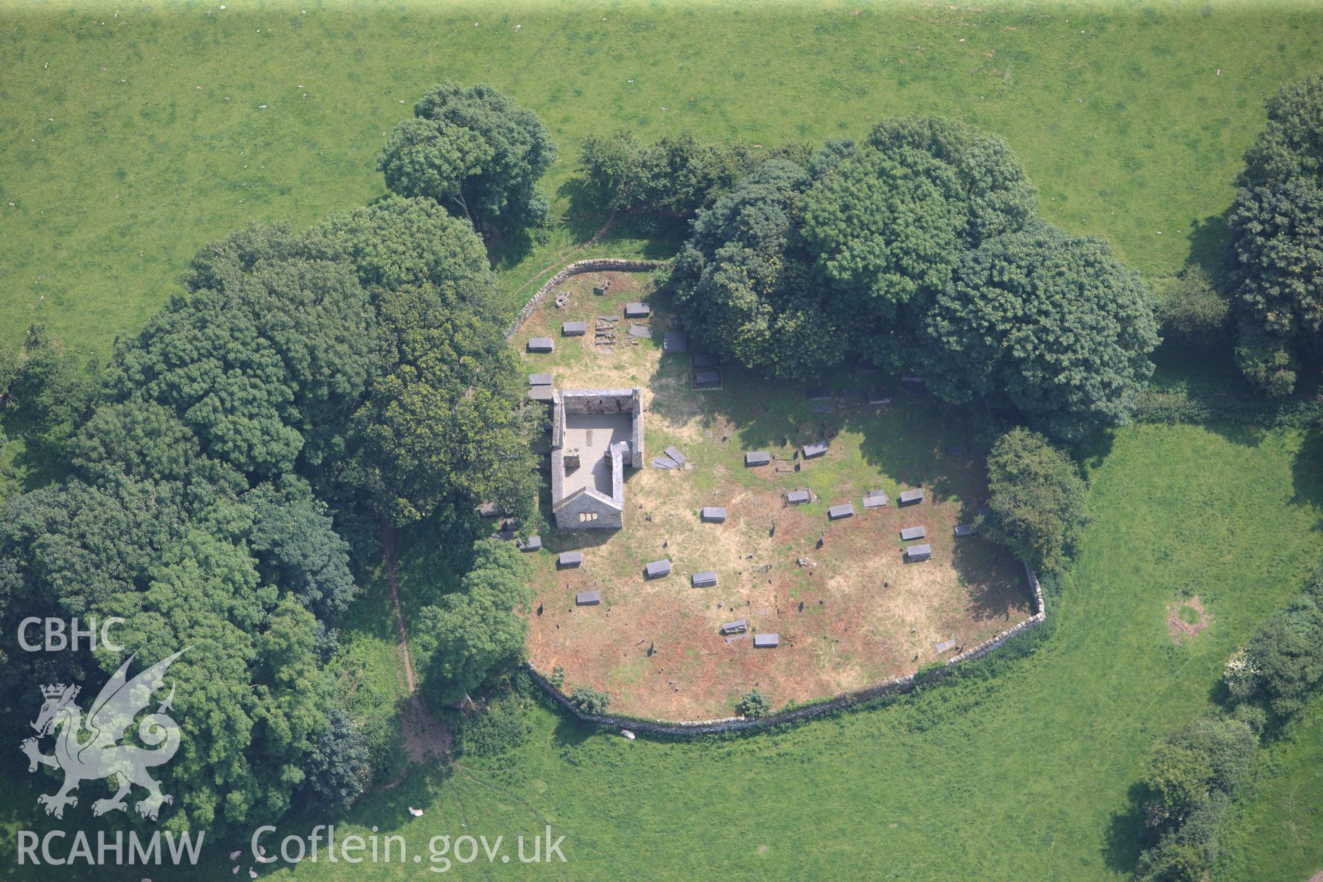 The site of St Michael's old church, Gaerwen, Llangefni, Anglesey. Oblique aerial photograph taken during the Royal Commission?s programme of archaeological aerial reconnaissance by Toby Driver on 12th July 2013.