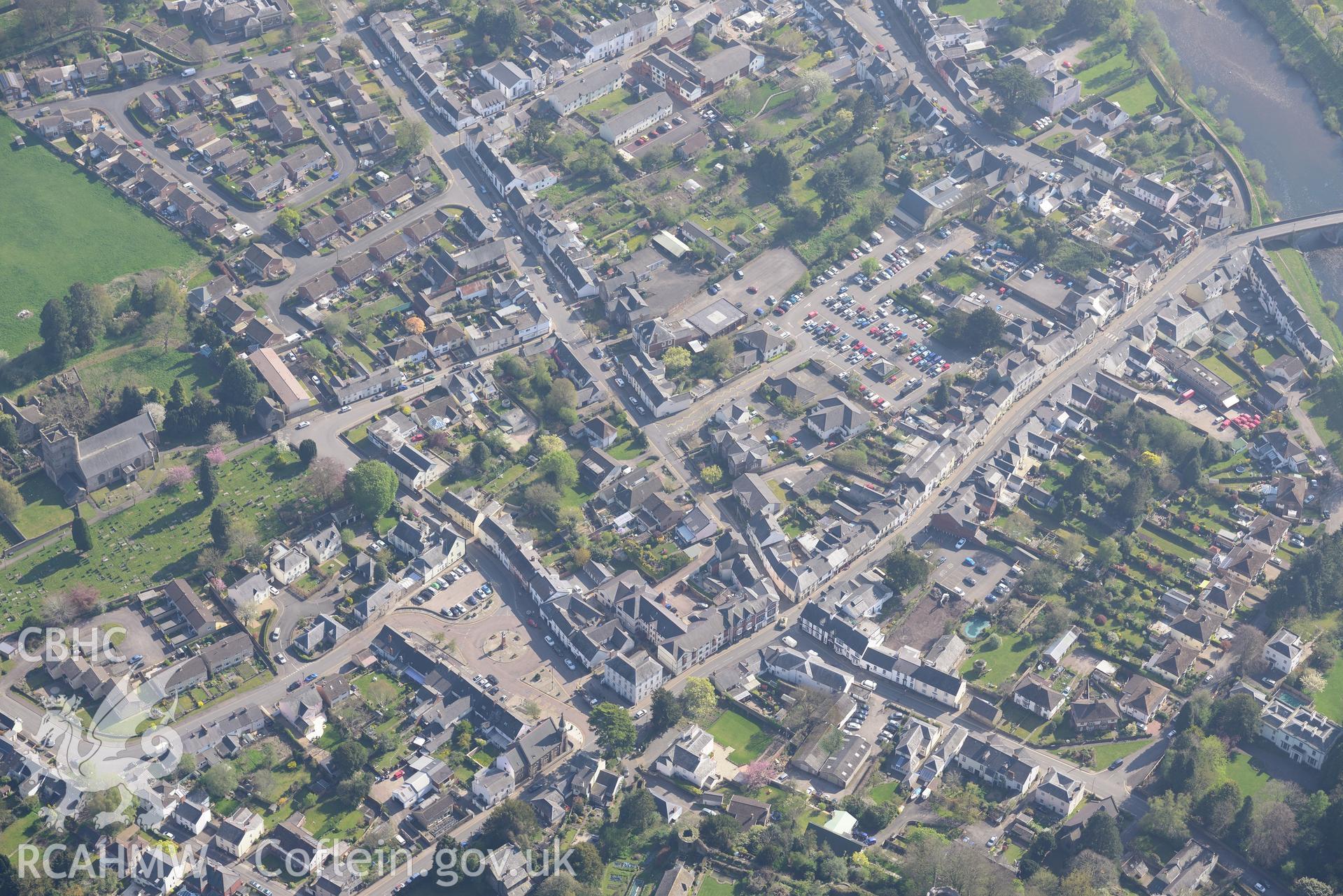 Usk Town including the road bridge and St. Mary's Church. Oblique aerial photograph taken during the Royal Commission's programme of archaeological aerial reconnaissance by Toby Driver on 21st April 2015