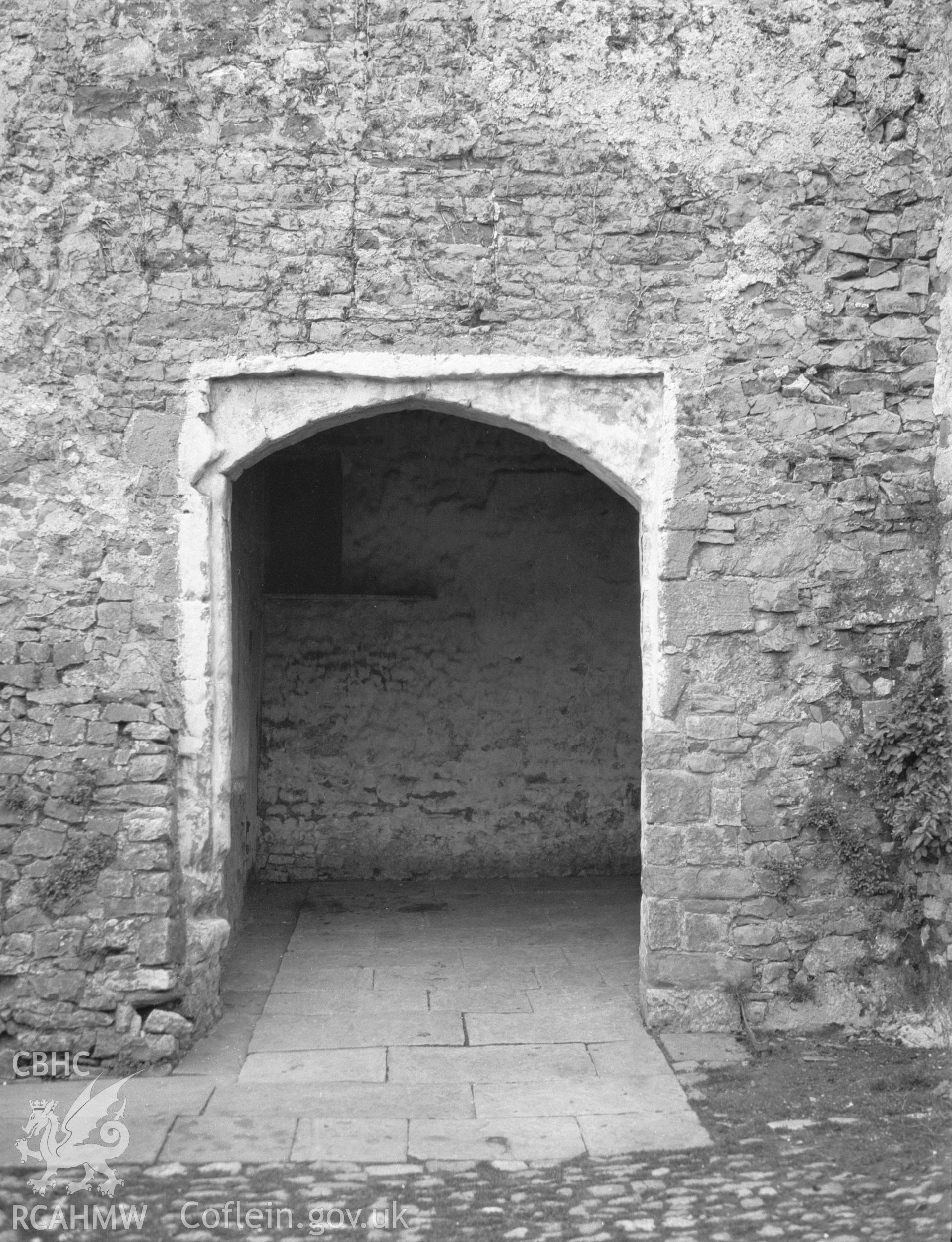 Digital copy of a nitrate negative showing exterior view of entrance to Penhow Castle, taken circa 1935. From the National Building Record Postcard Collection.