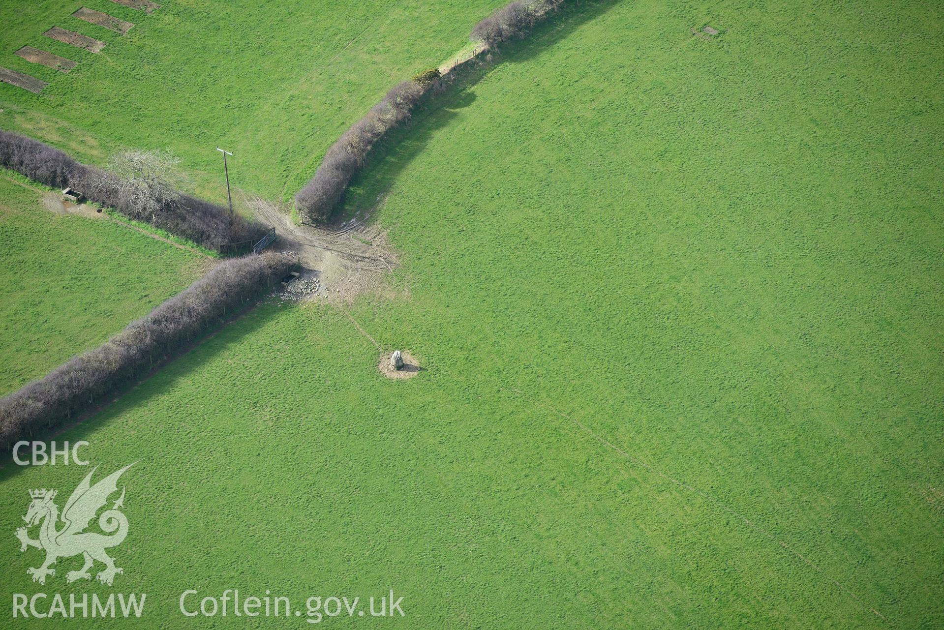 Parc-y-Garreg standing stone, Trefaes Maenhir, near Cardigan. Oblique aerial photograph taken during the Royal Commission's programme of archaeological aerial reconnaissance by Toby Driver on 13th March 2015.