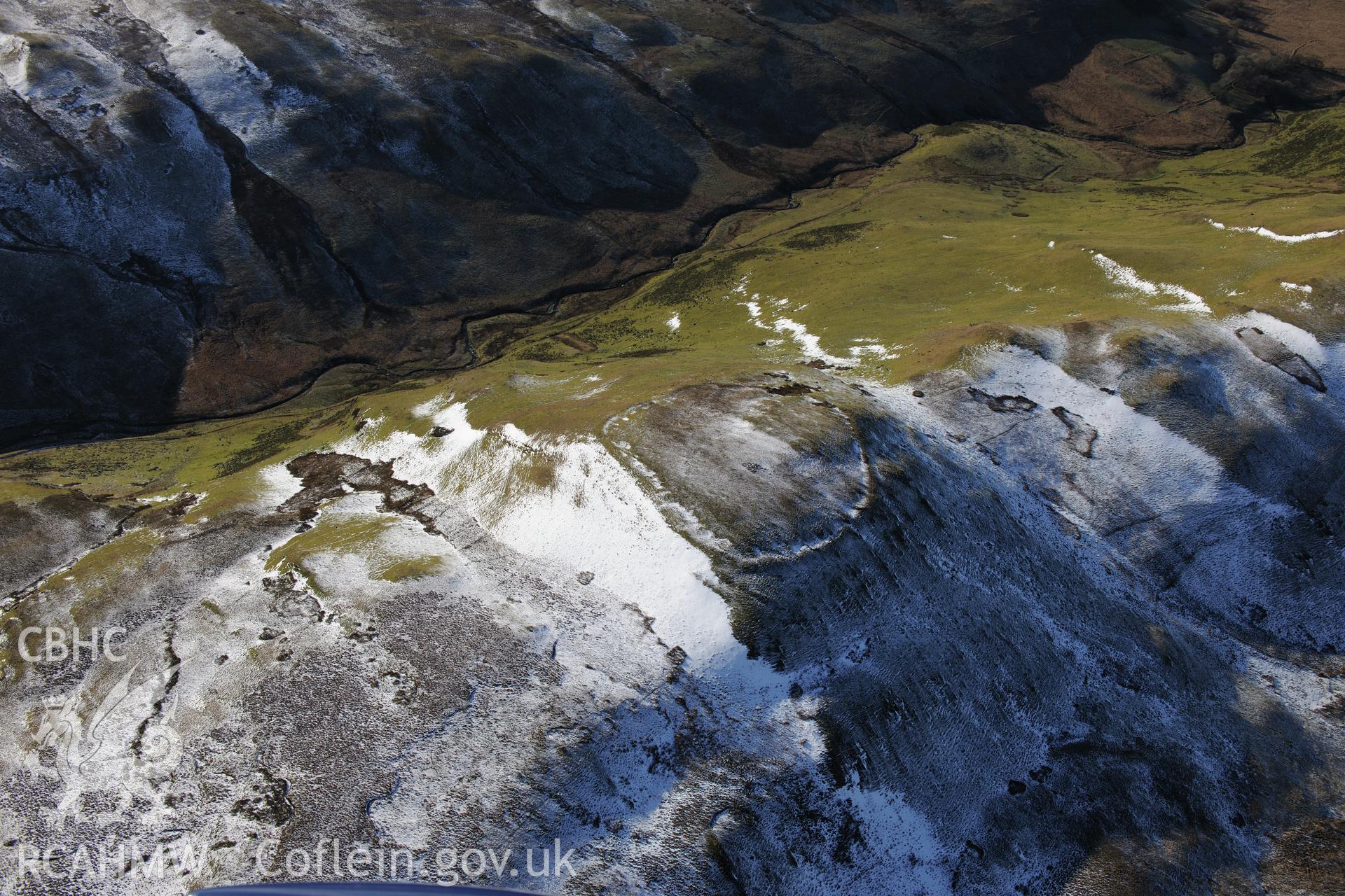 Castell Rhyfel hillfort, east of Tregaron. Oblique aerial photograph taken during the Royal Commission's programme of archaeological aerial reconnaissance by Toby Driver on 4th February 2015.