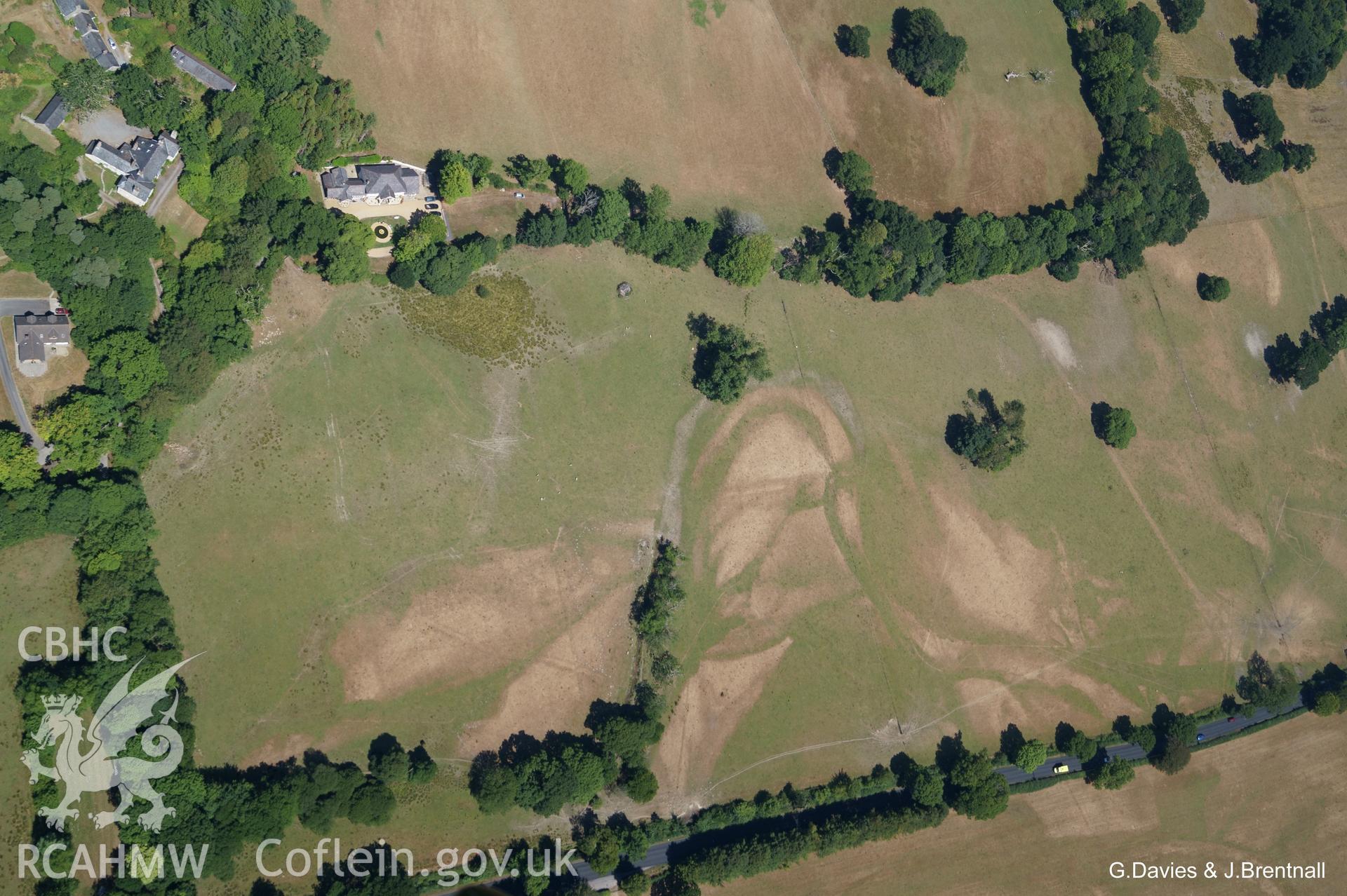 Aerial photograph showing 'lines and river-like shapes with no clear geometrical structures visible' at Dolau Mansion, on the northern banks of the Rheidol. Photographed by Glyn Davies and Jonathan Brentnall on 22nd July 2018, under drought conditions.