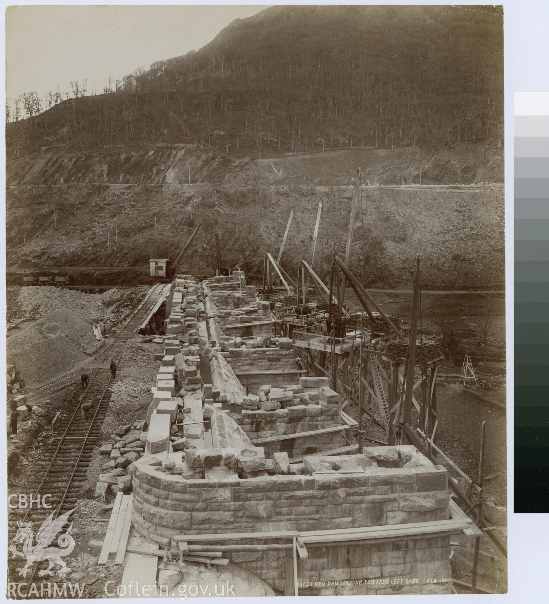 Digital copy of an albumen print from Edward Hubbard Collection showing Carreg Ddu Dam looking towards the left bank, taken February 1898.